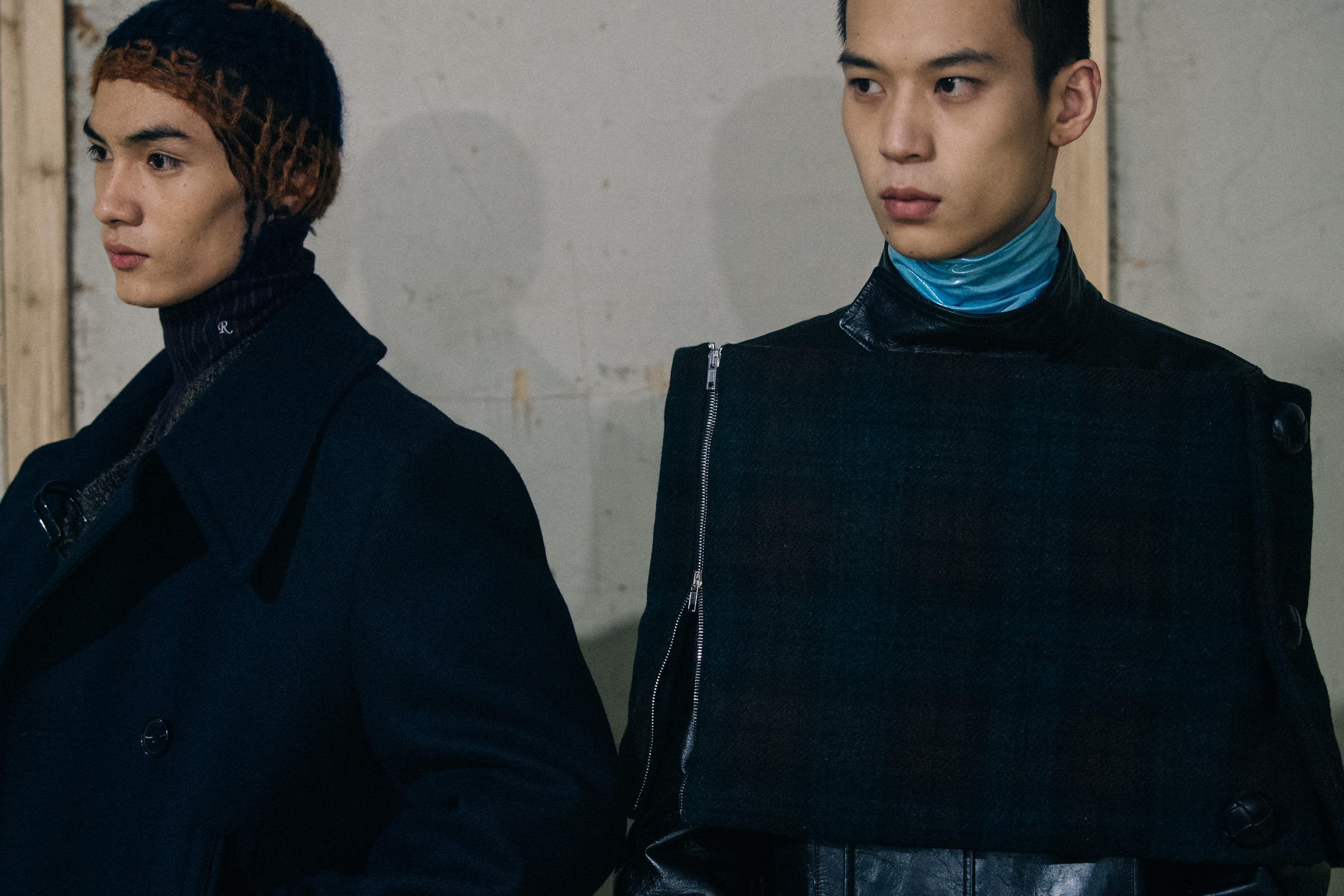 Models wearing black Raf Simons