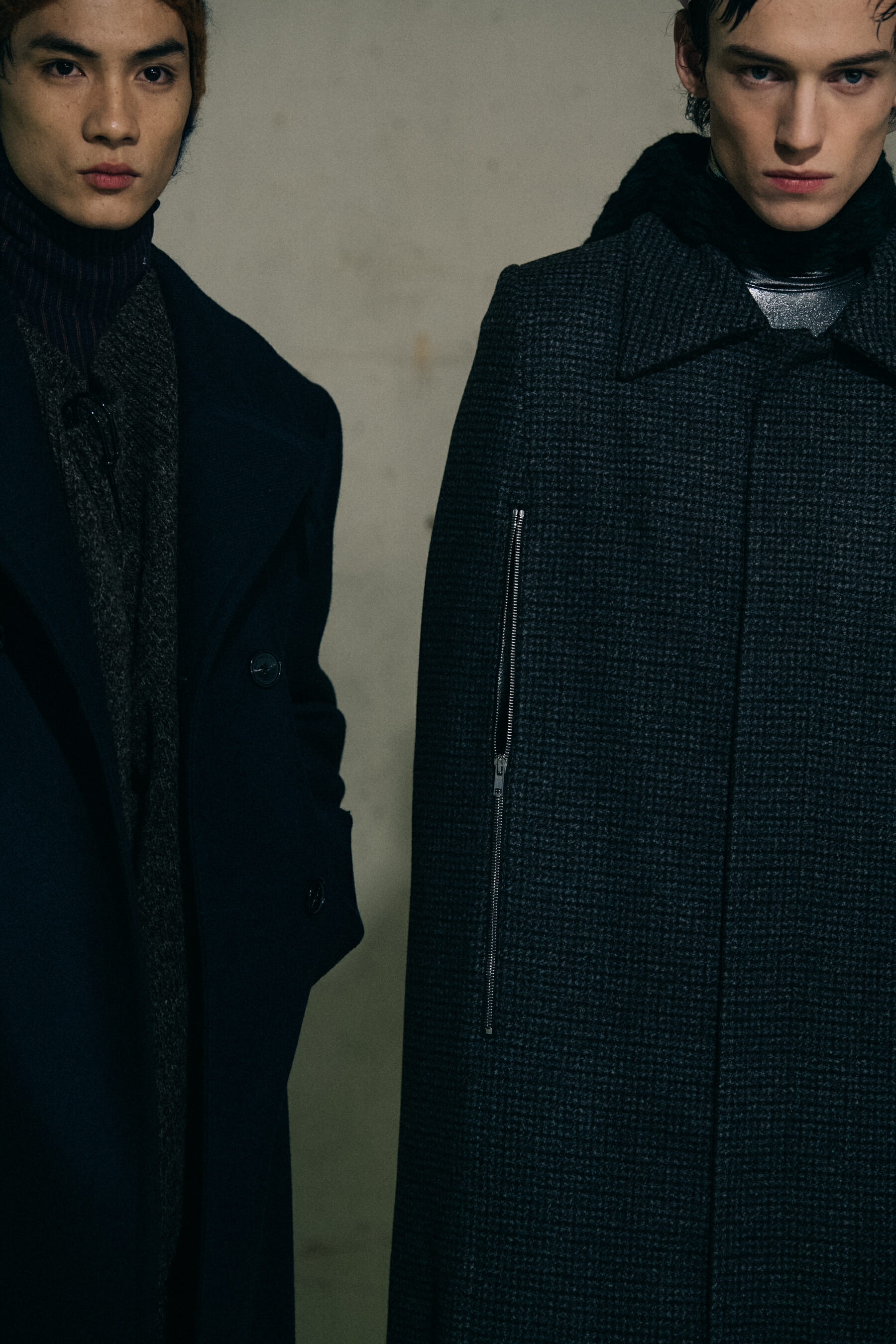 Models wearing black Raf Simons