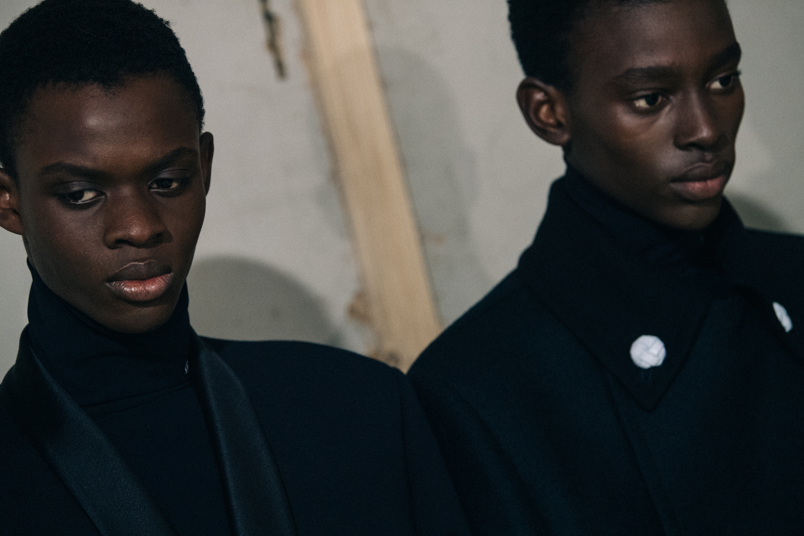 Models wearing black Raf Simons