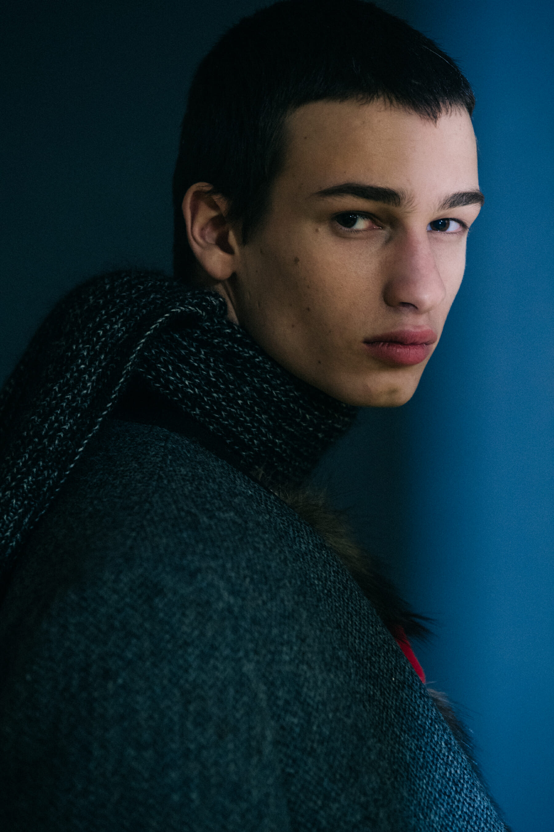 Models wearing wool at Raf Simons