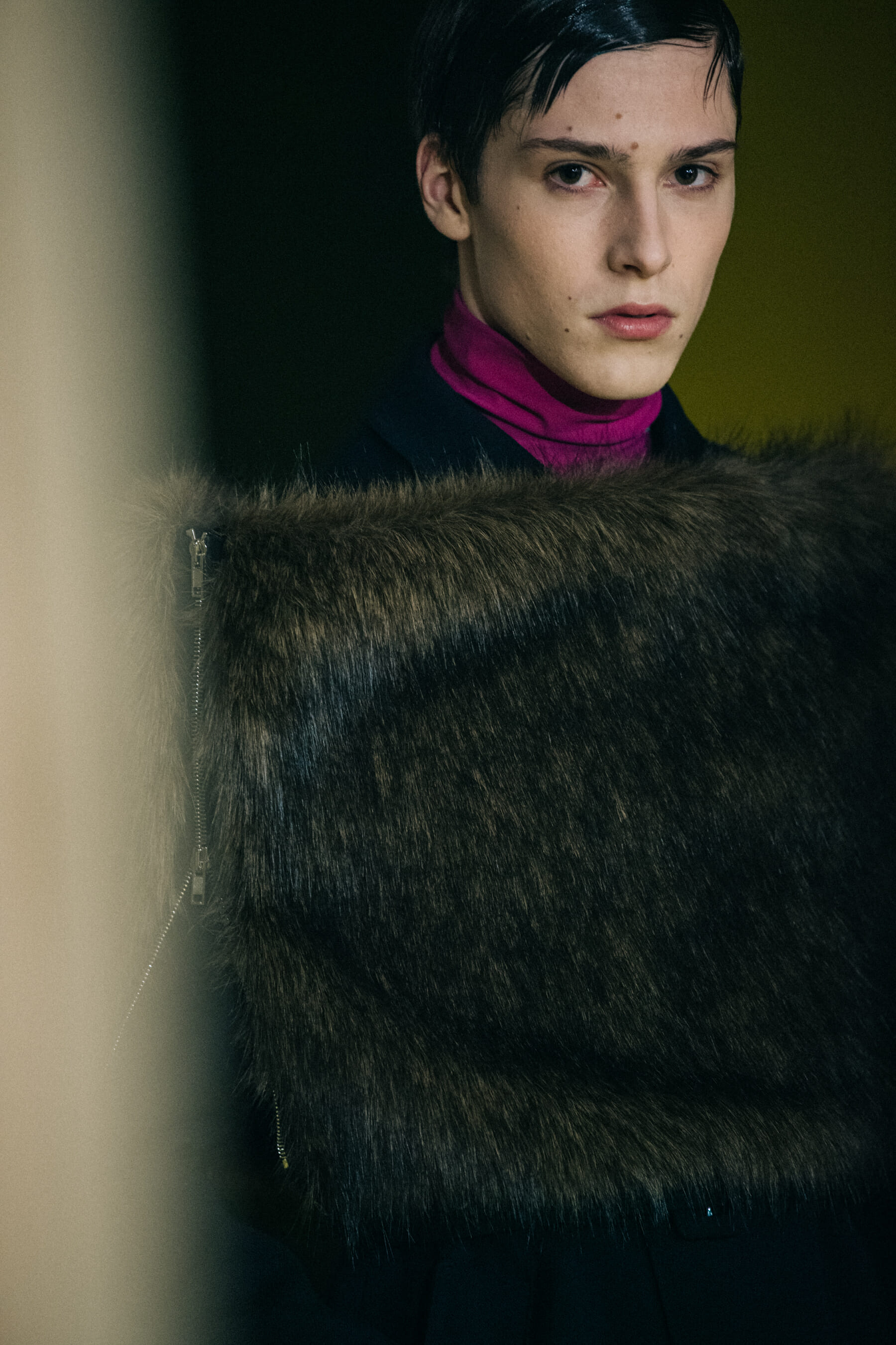 Models wearing fur at Raf Simons