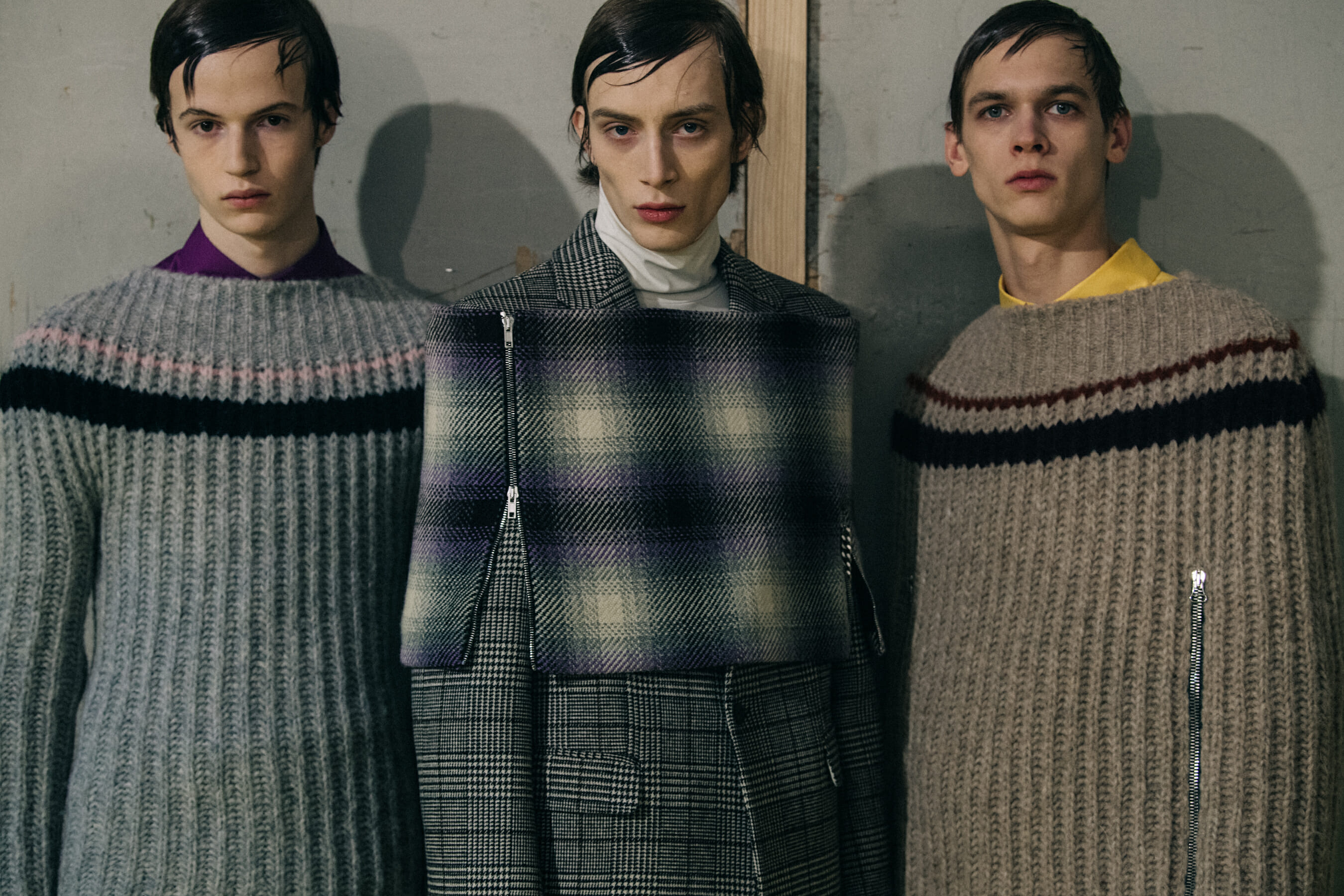 Models wearing wool at Raf Simons