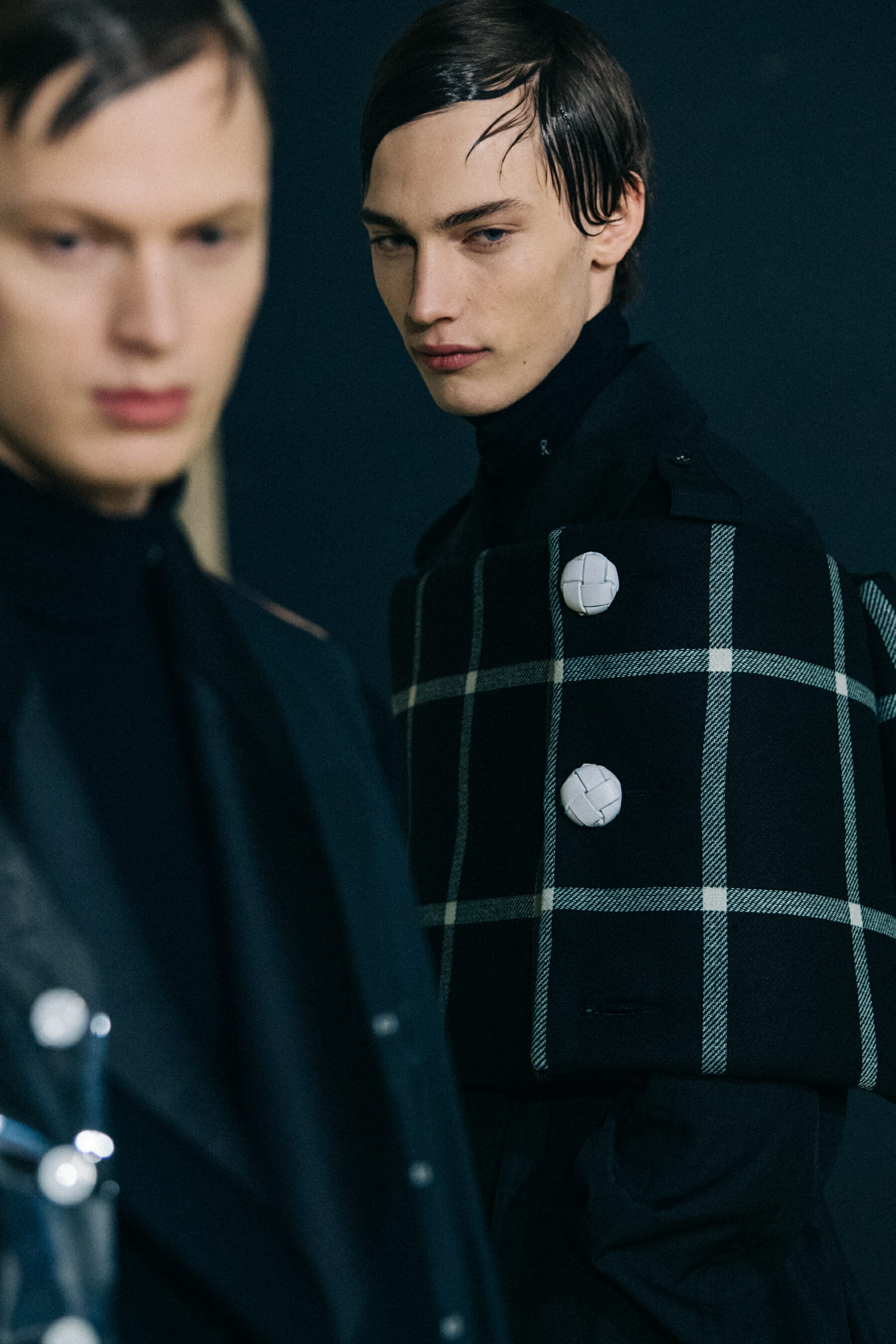 Models wearing black Raf Simons