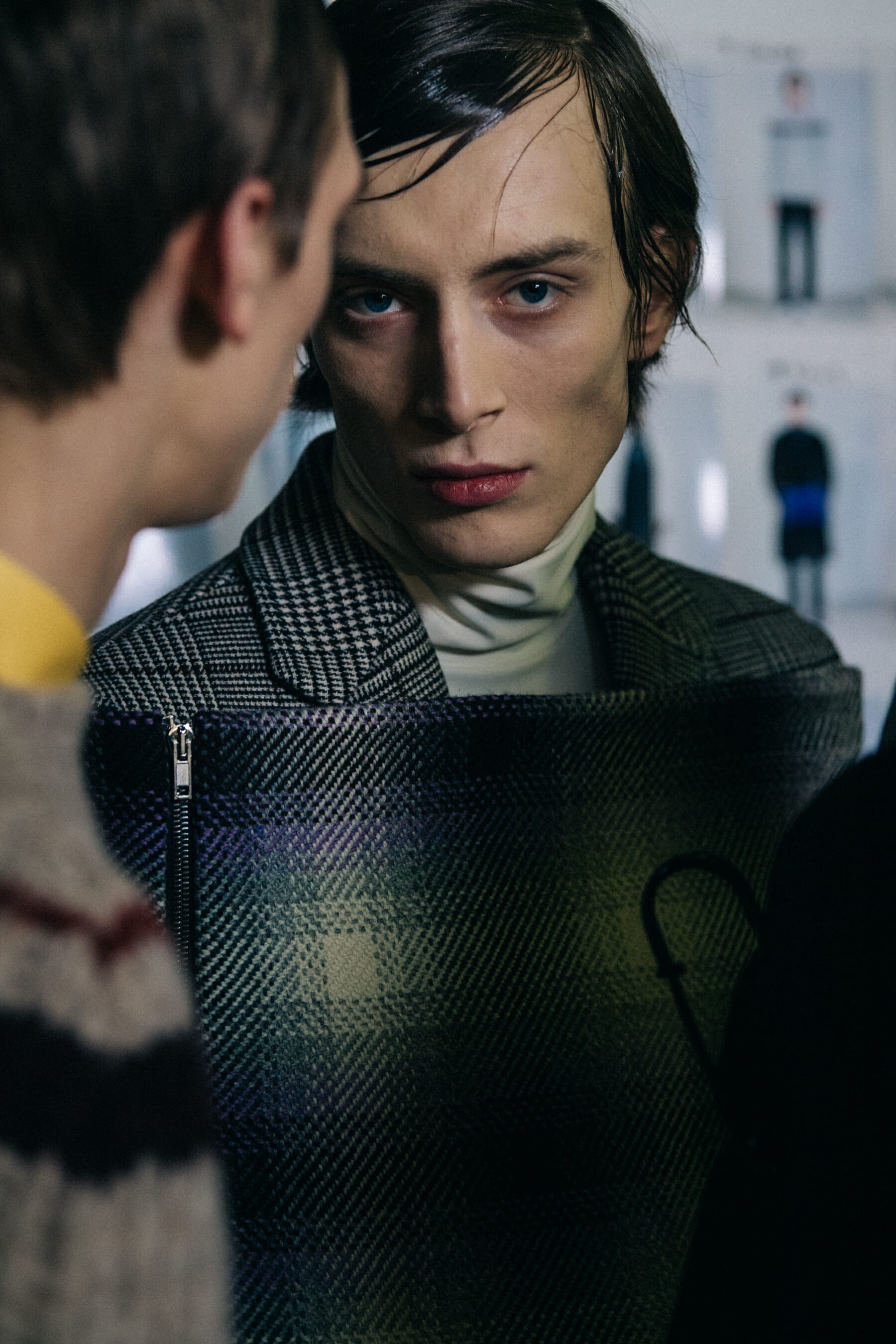 Models wearing wool at Raf Simons