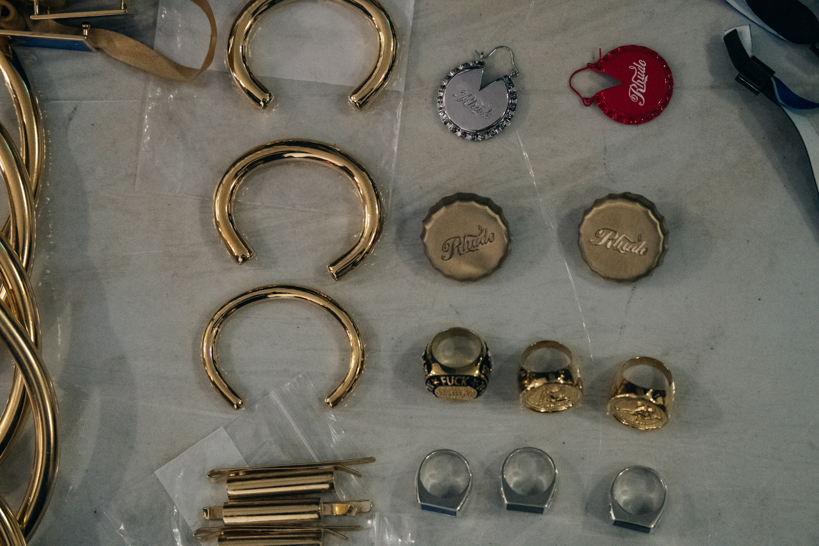 Bags and jewellery at Rhude