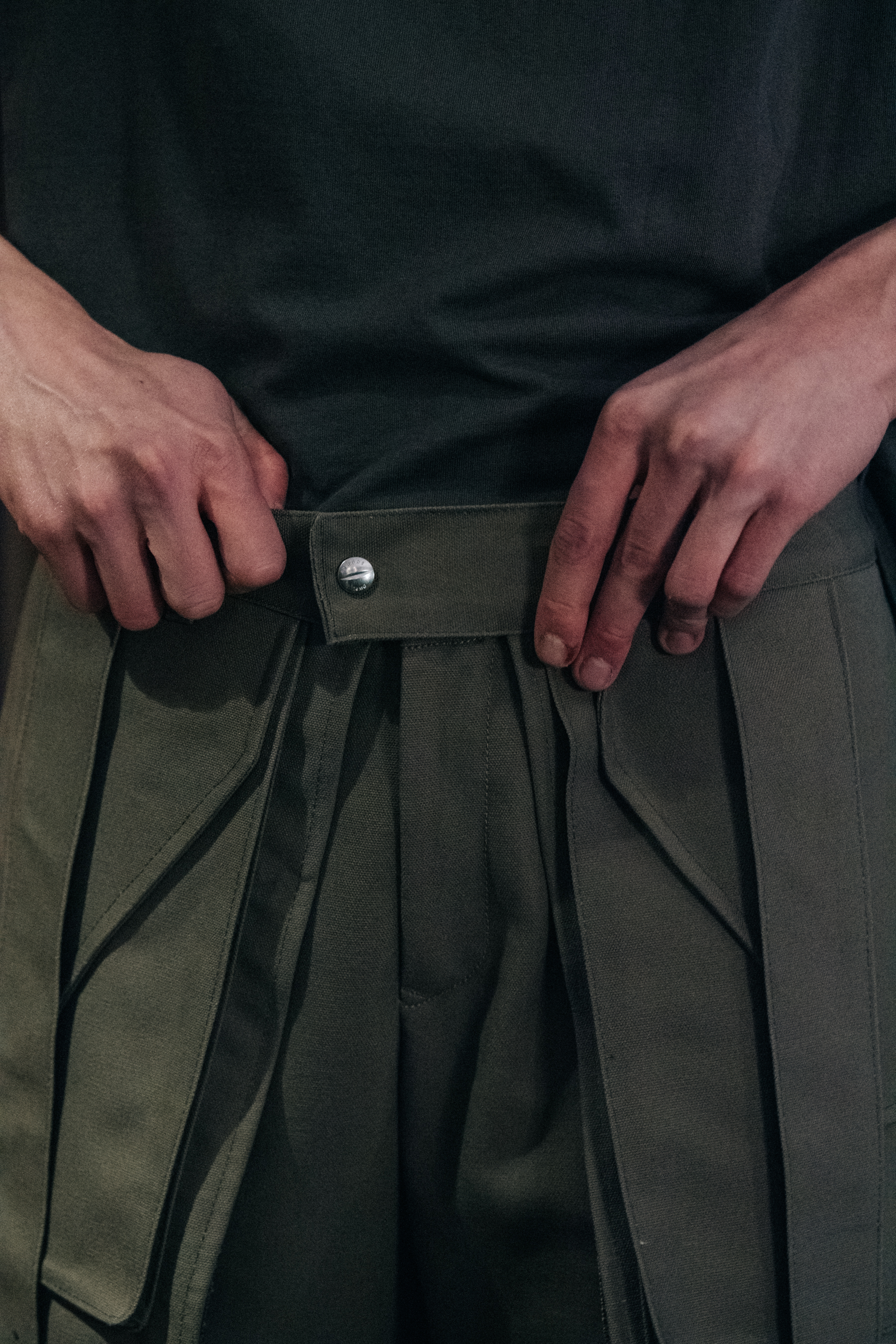 Model wearing Rhude suit