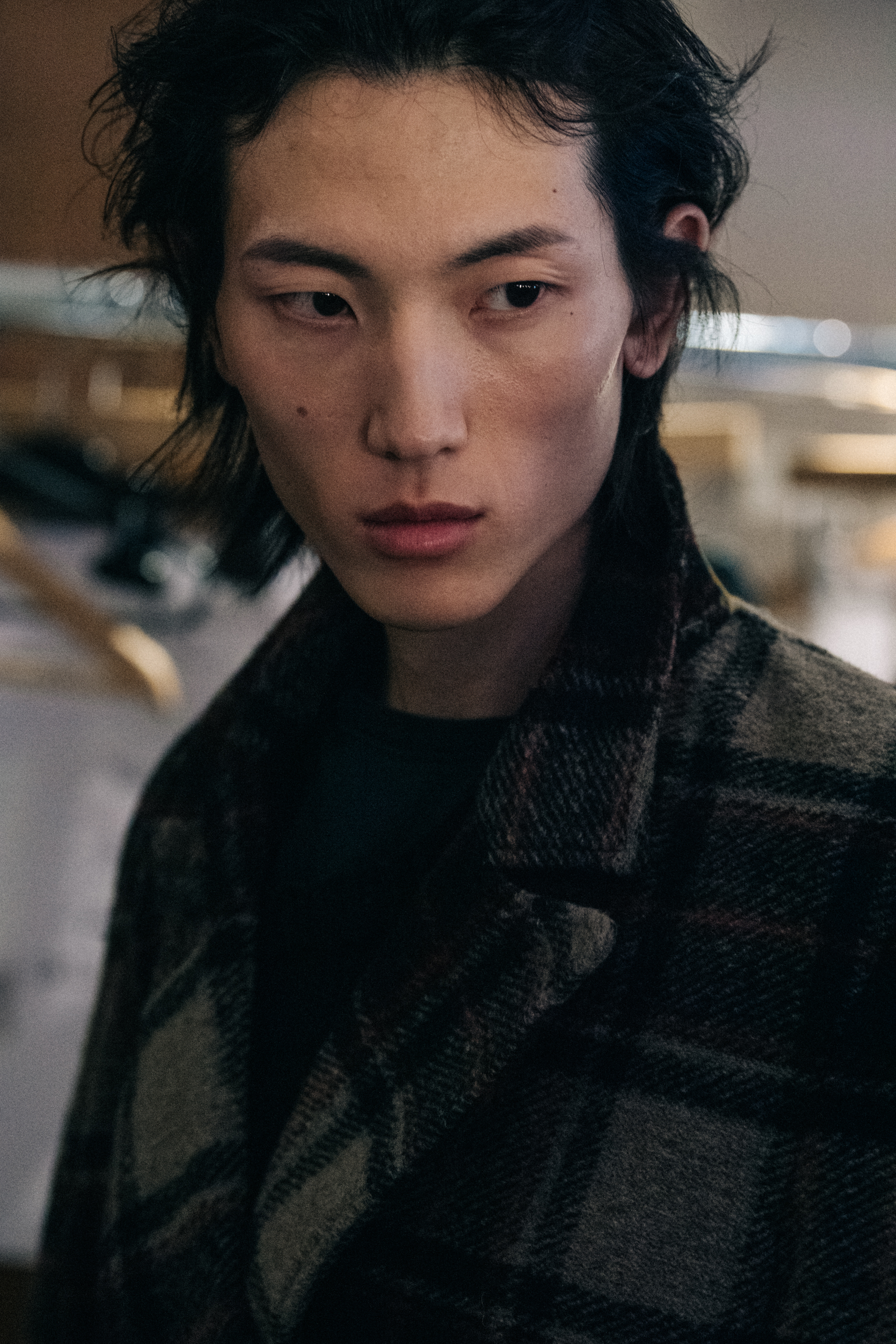 Model wearing check outfit