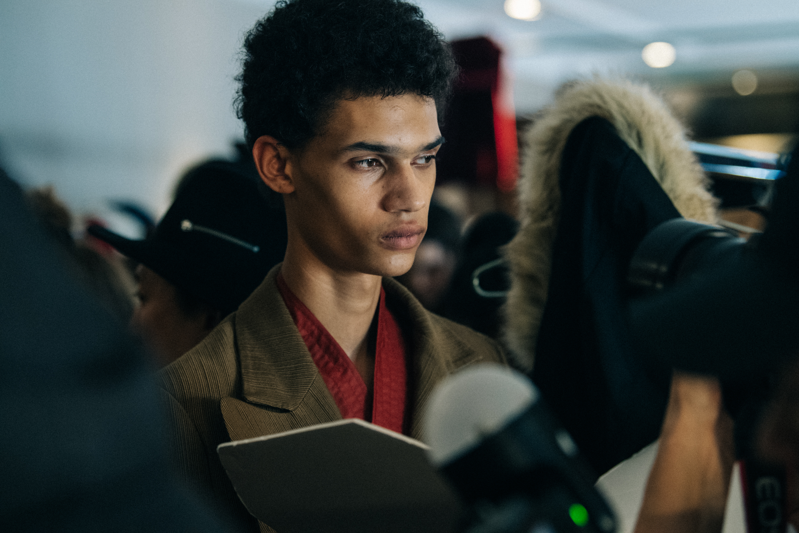 Model wearing red jacket