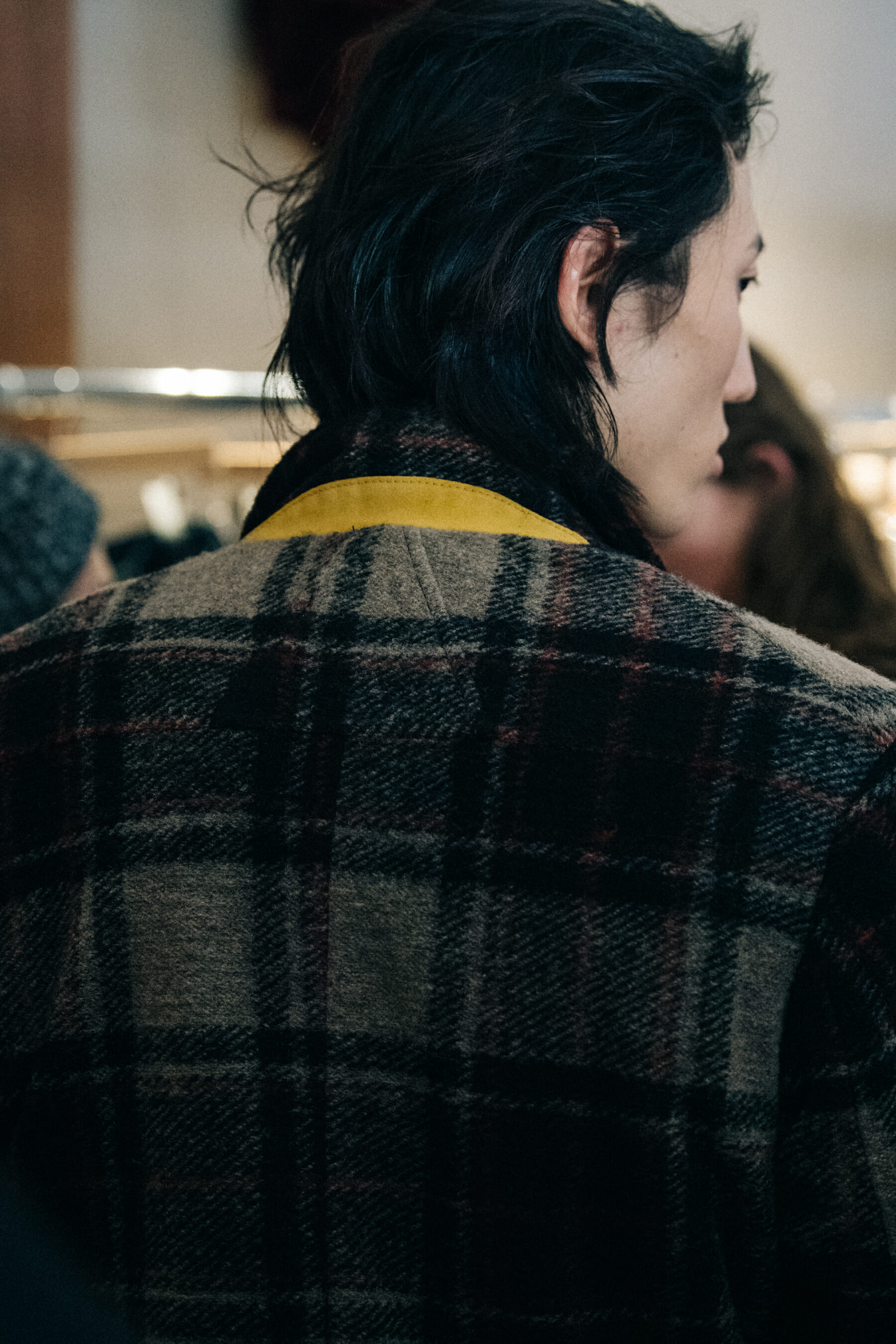 Model wearing check outfit