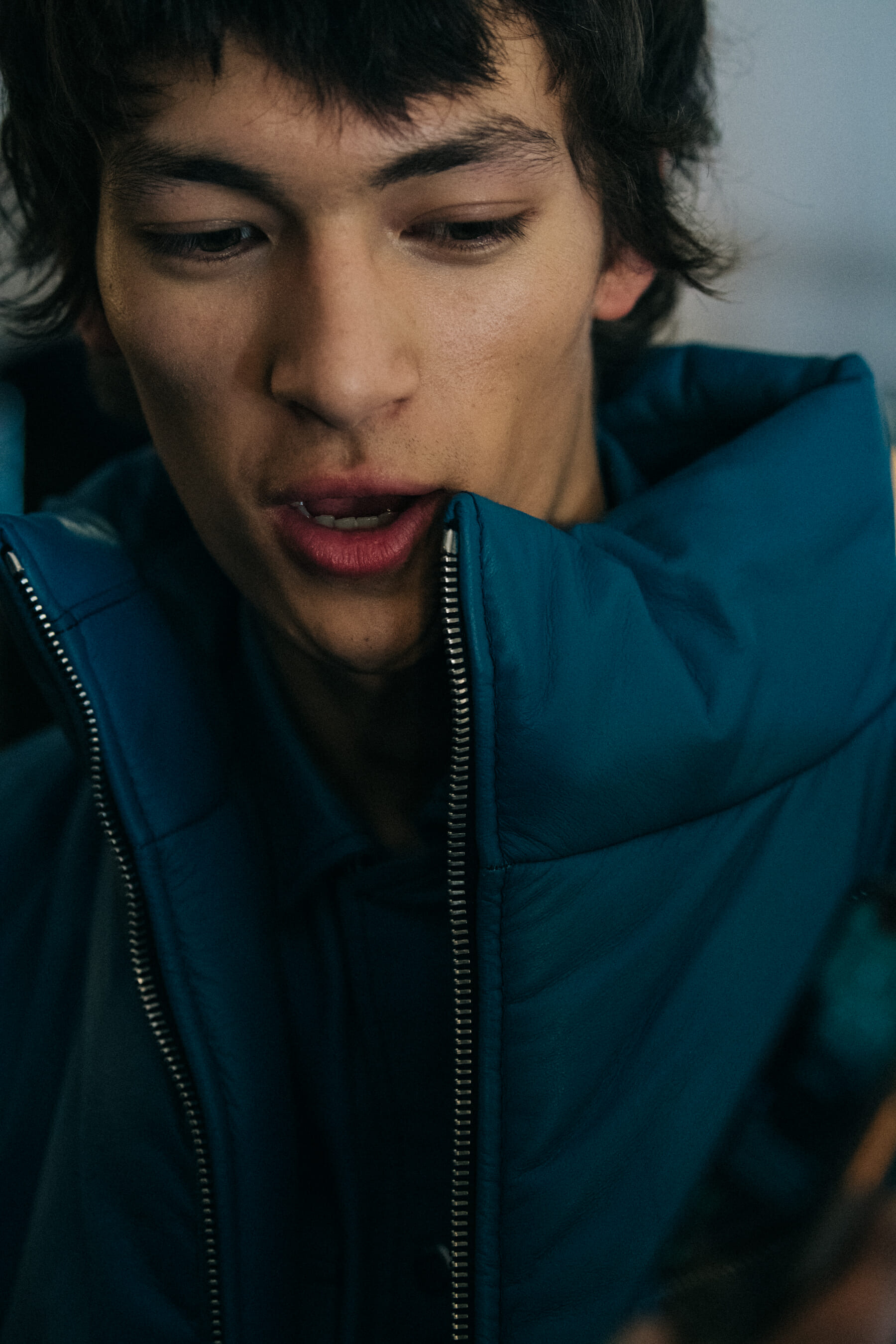 Model wearing dark jacket