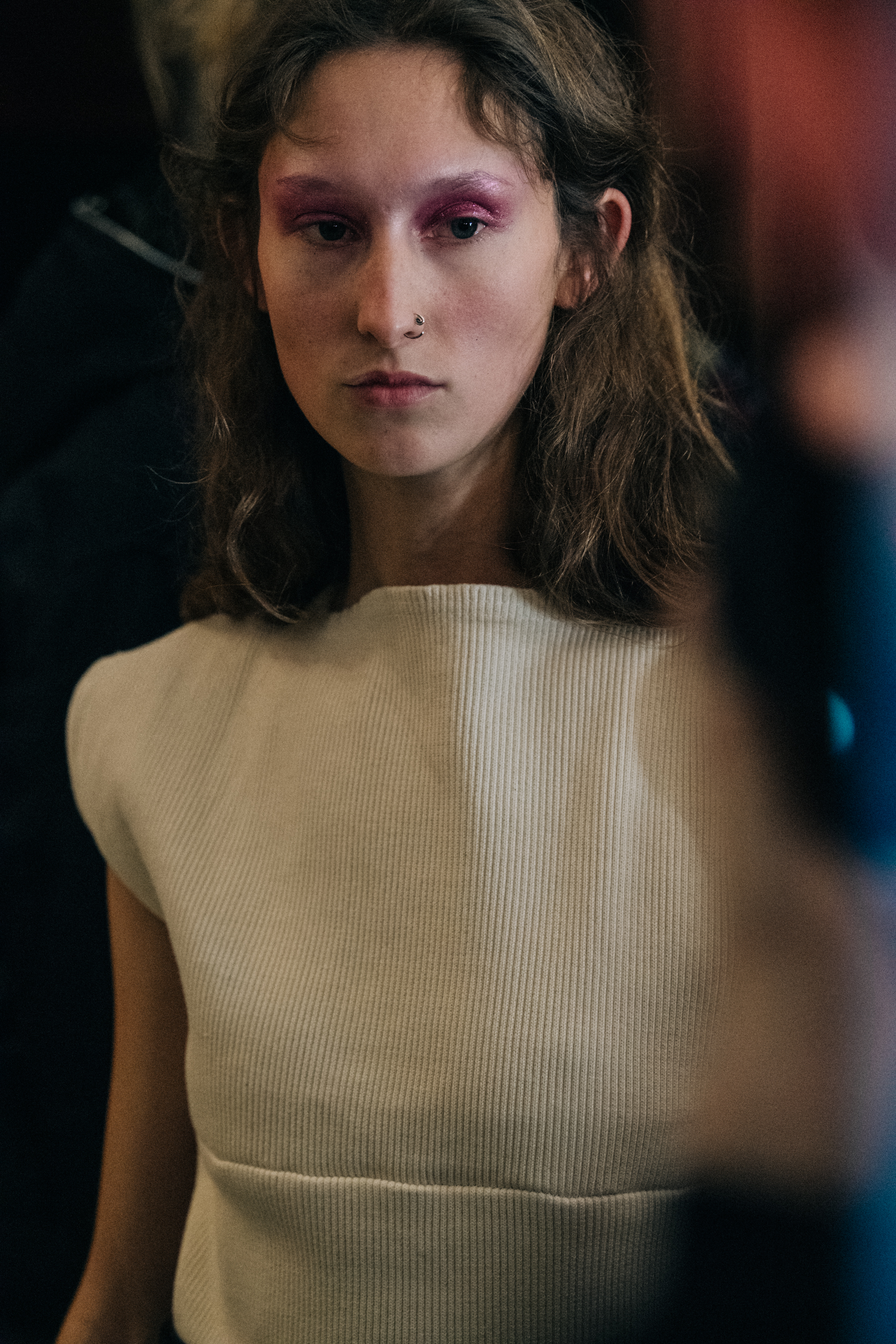 Model wearing purple eye makeup