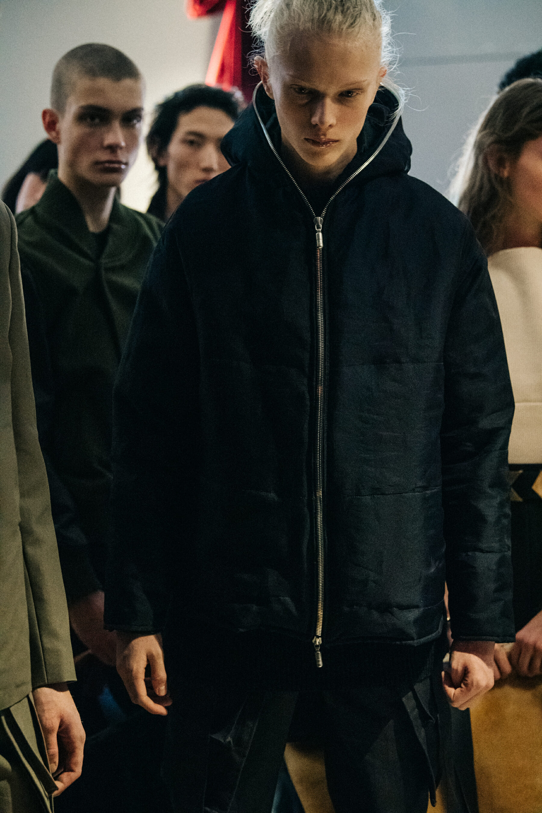 Model wearing dark jacket