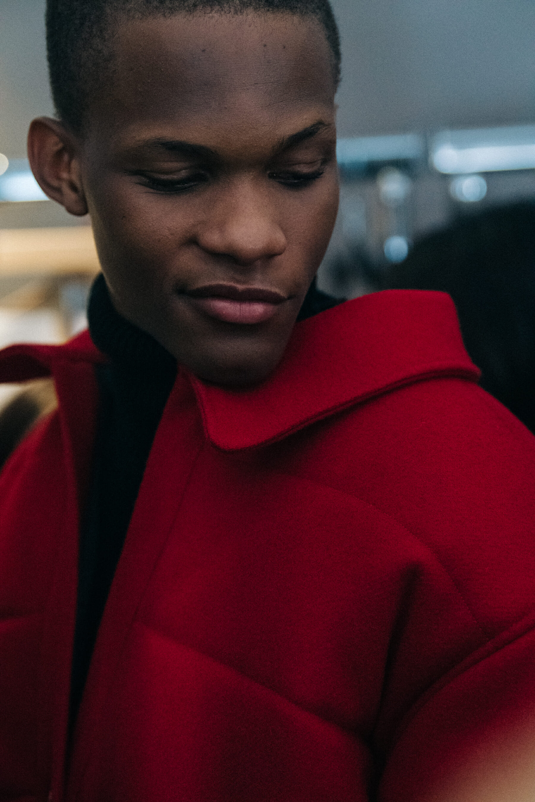 Model wearing red jacket