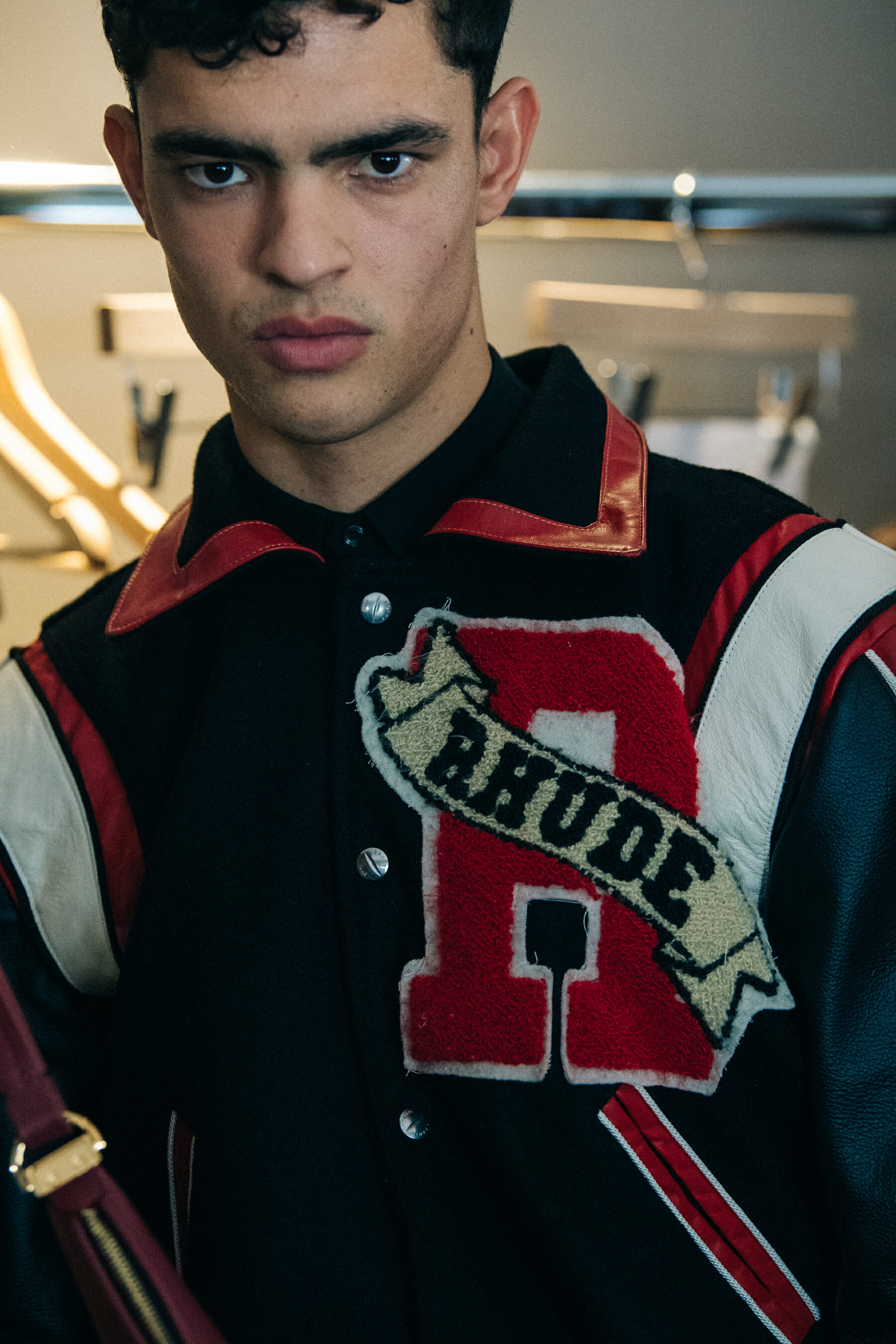 Model wearing red jacket