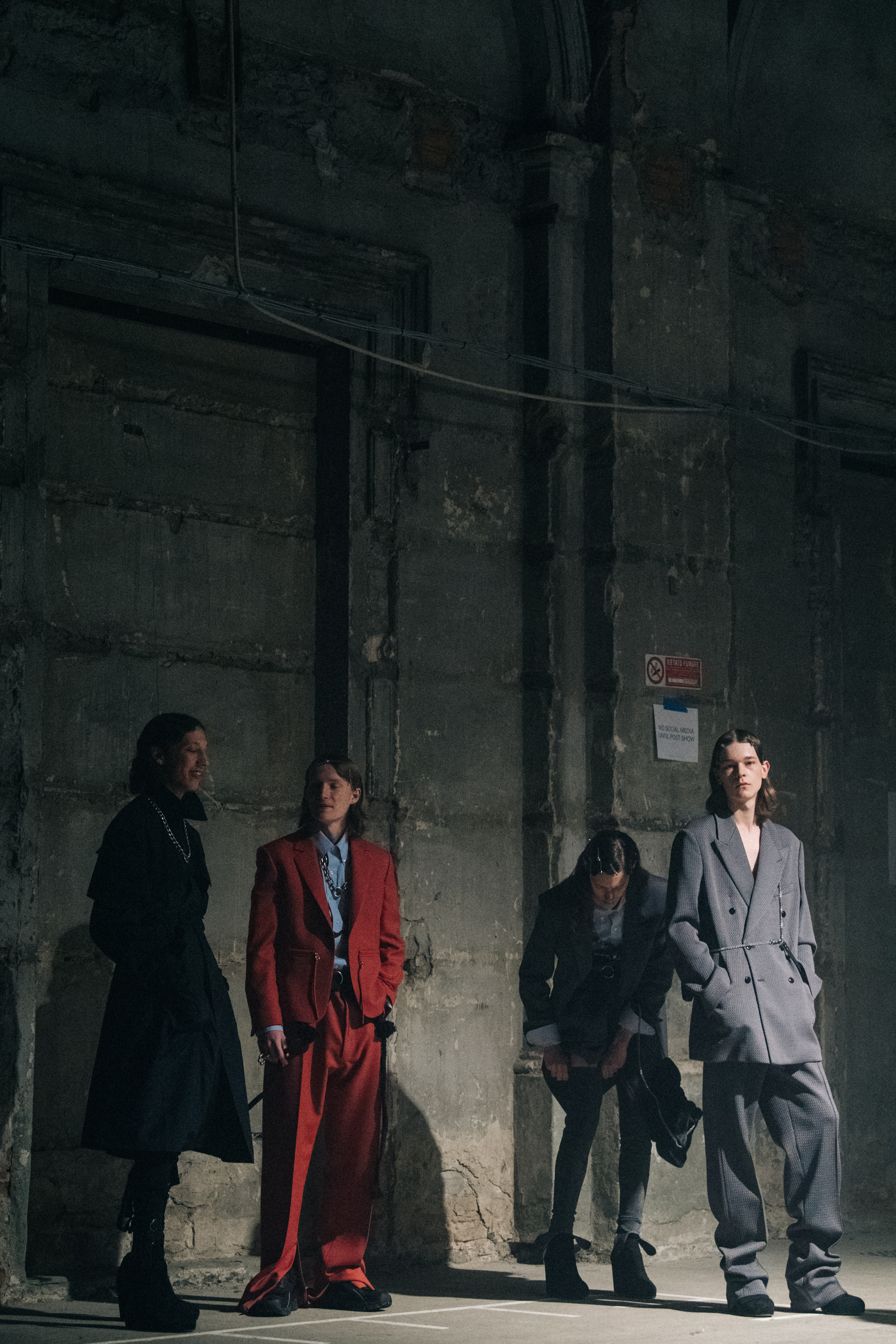 Models wearing dark outfits at Stefano Pilati