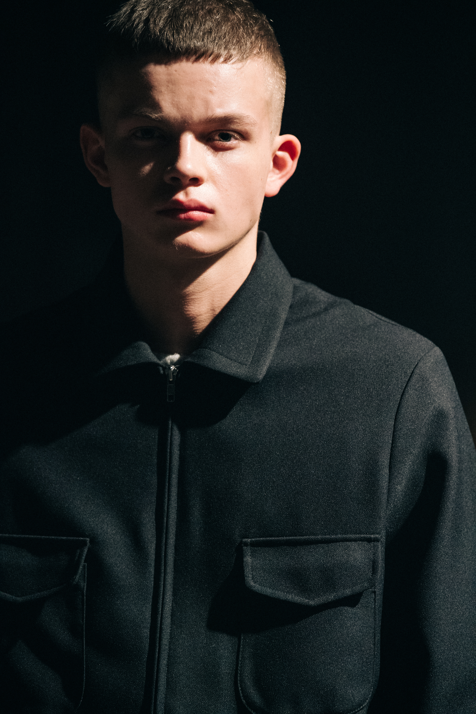 Models wearing dark outfits at Stefano Pilati