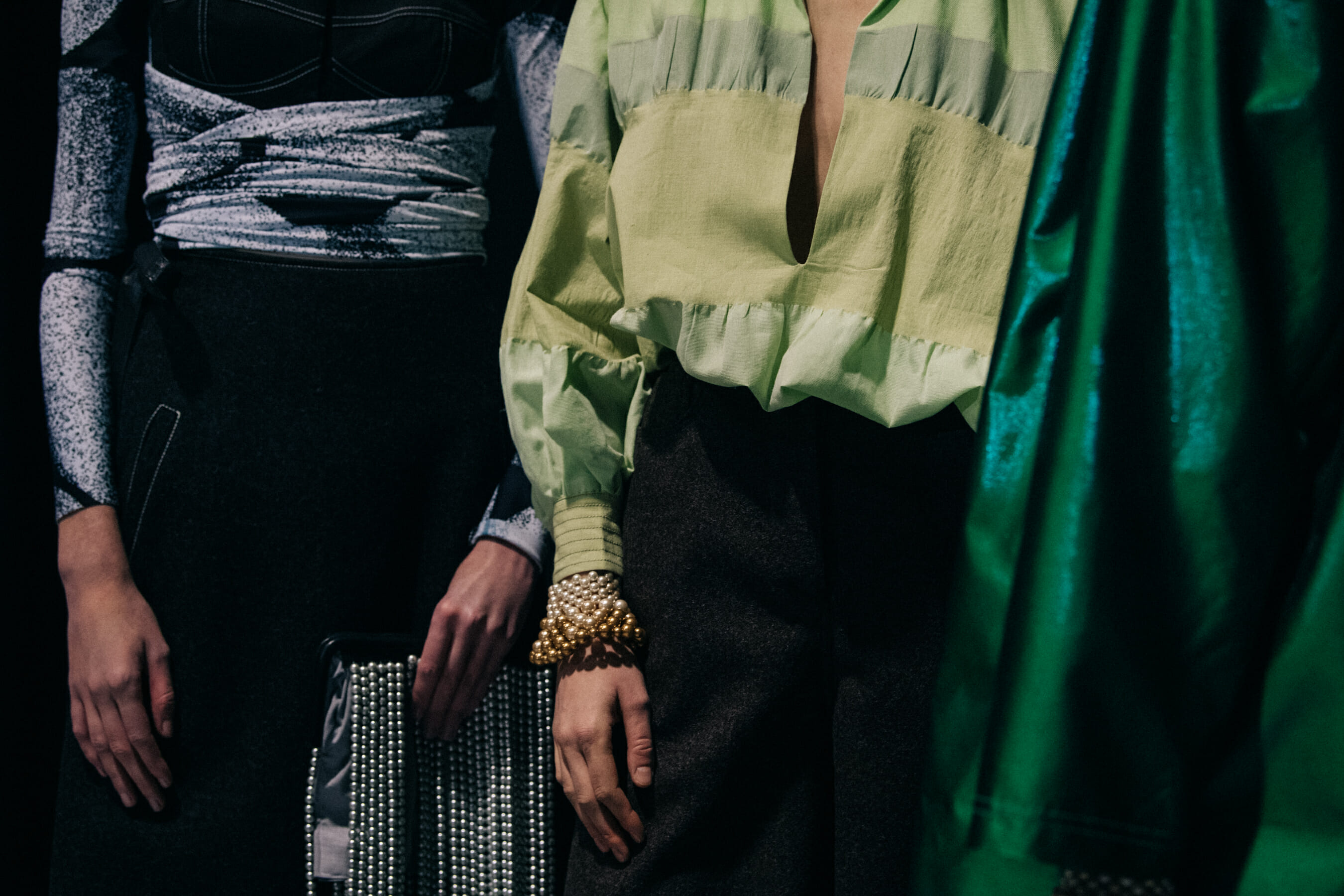 Models wearing Sunnei outfits backstage