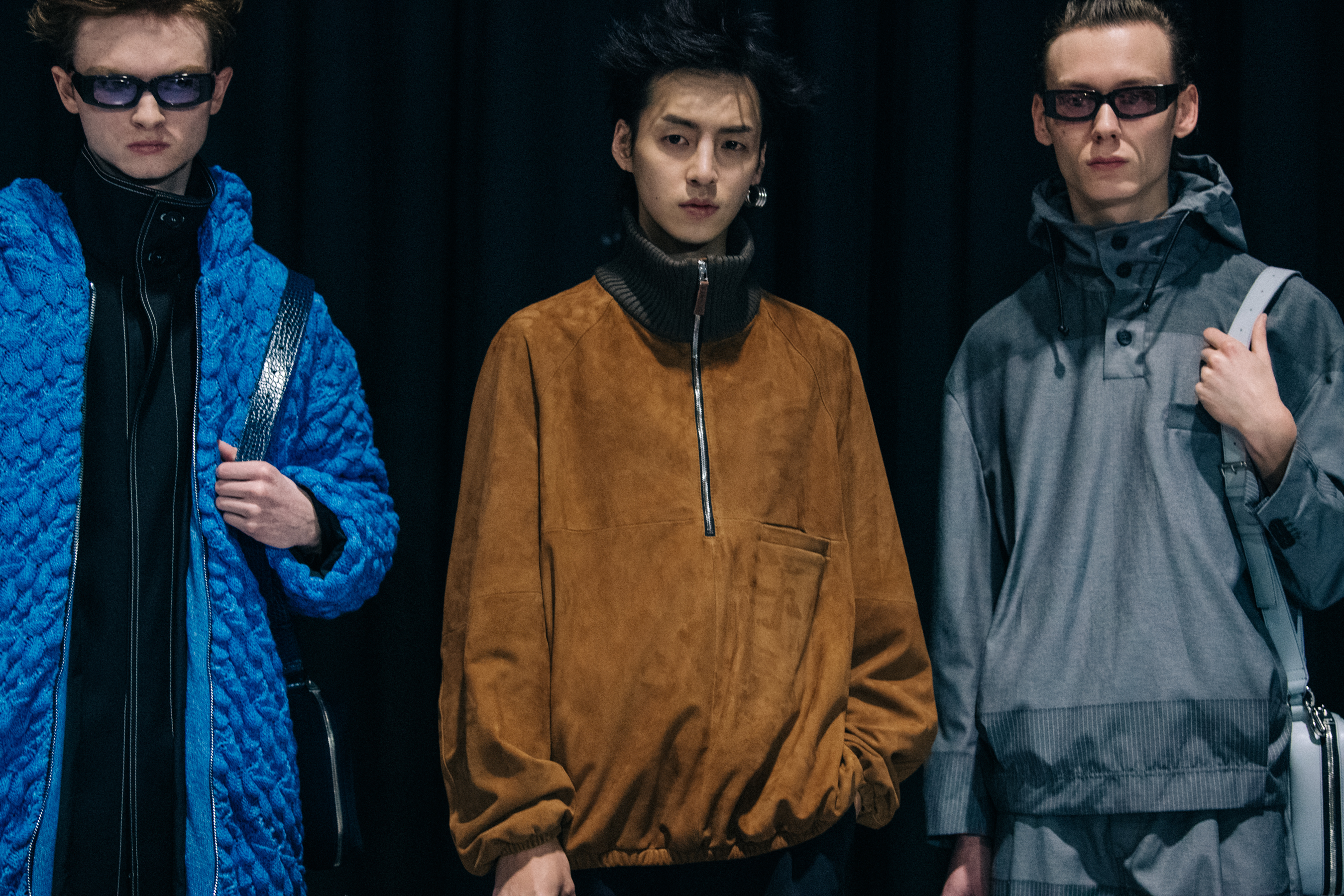 Models wearing Sunnei outfits backstage