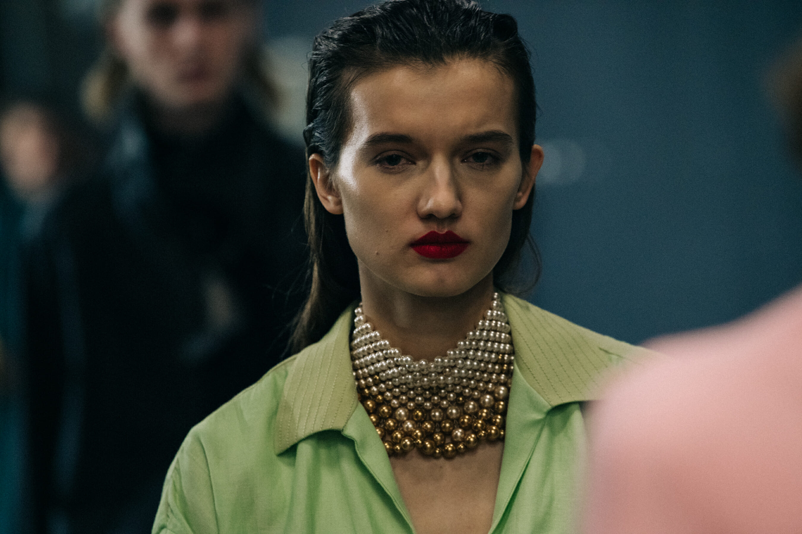 Model wearing silver and gold jewellery