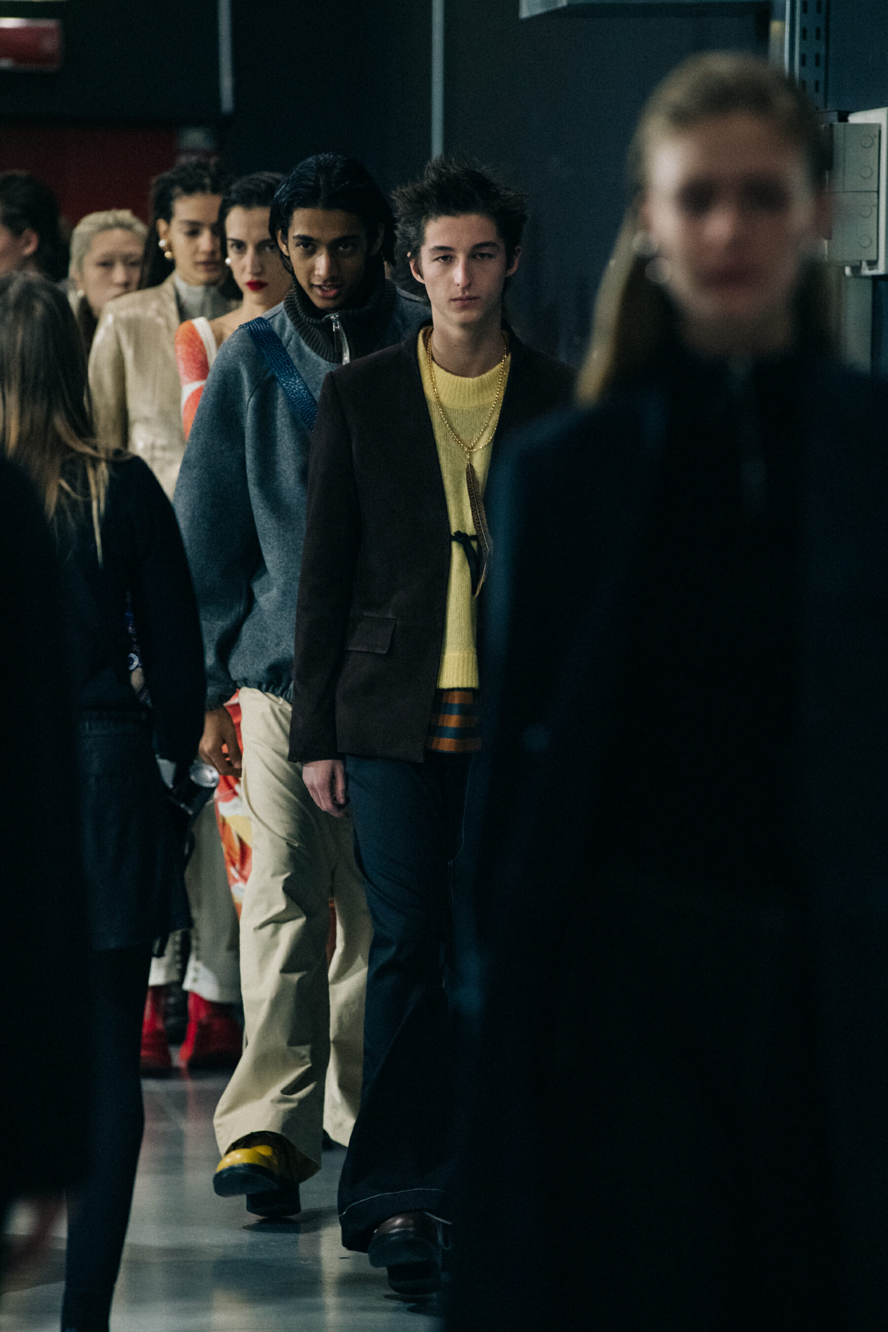 Models wearing Sunnei outfits backstage