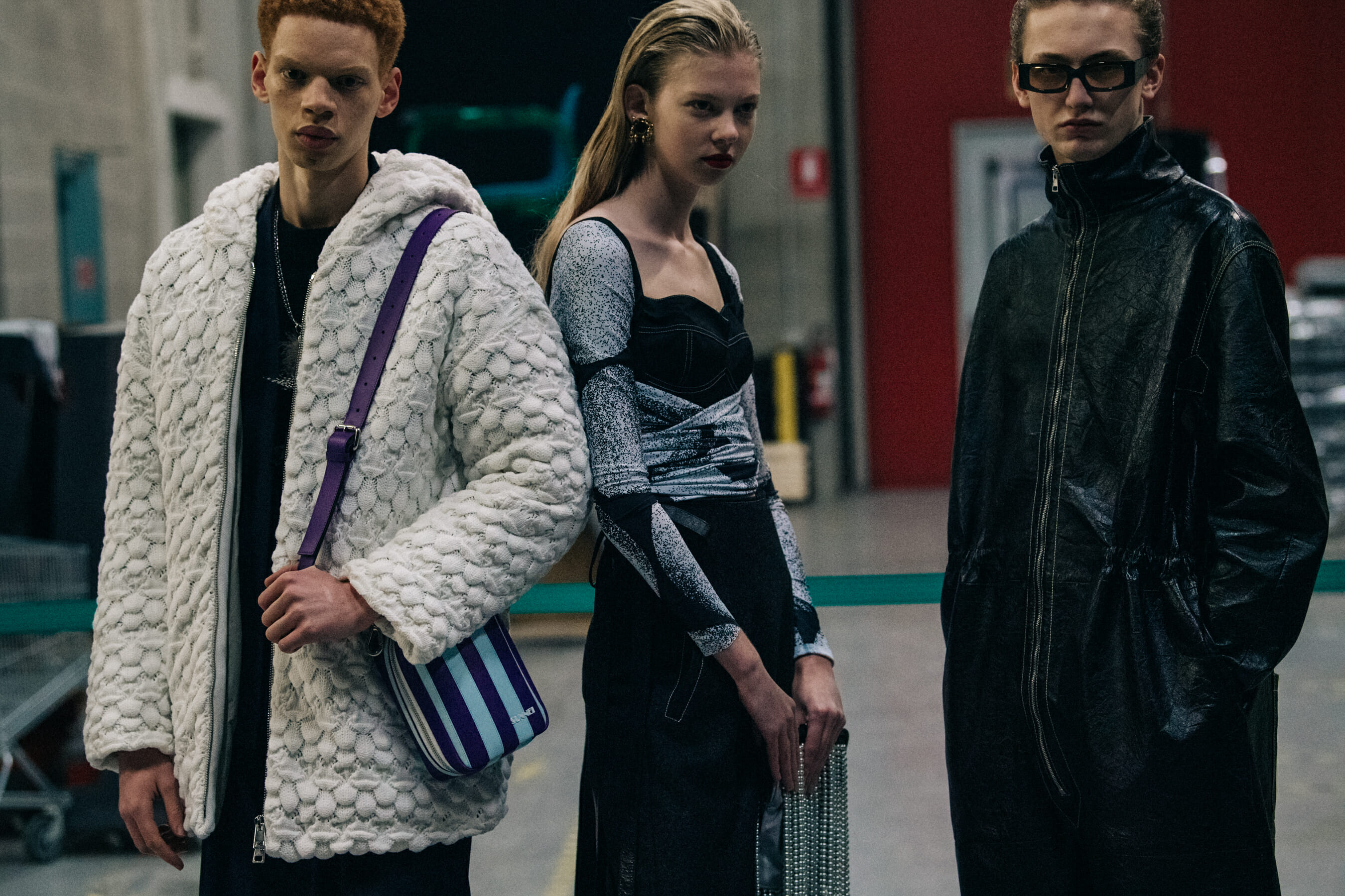 Models wearing Sunnei outfits backstage