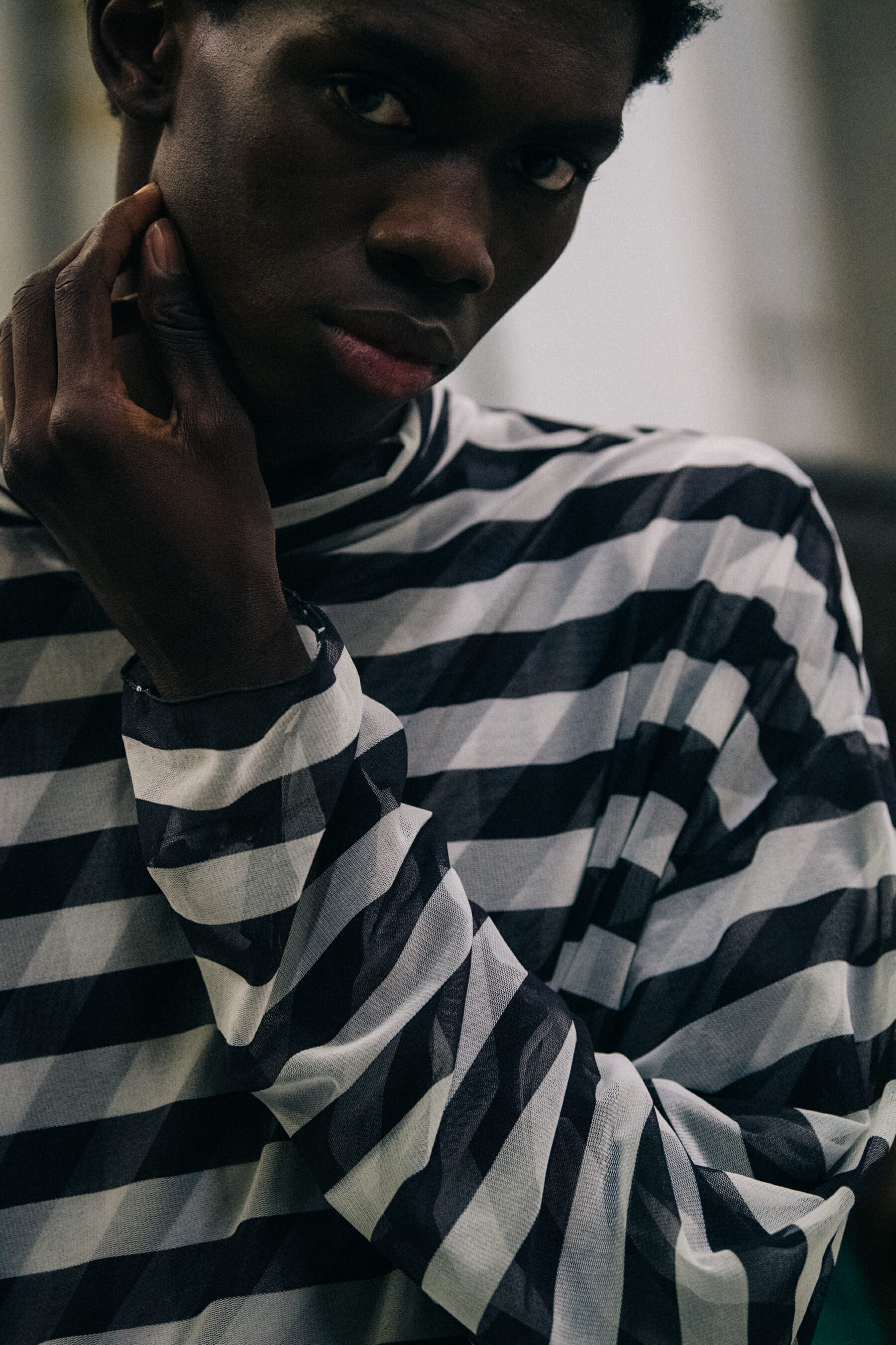 Model wearing black and white outfit