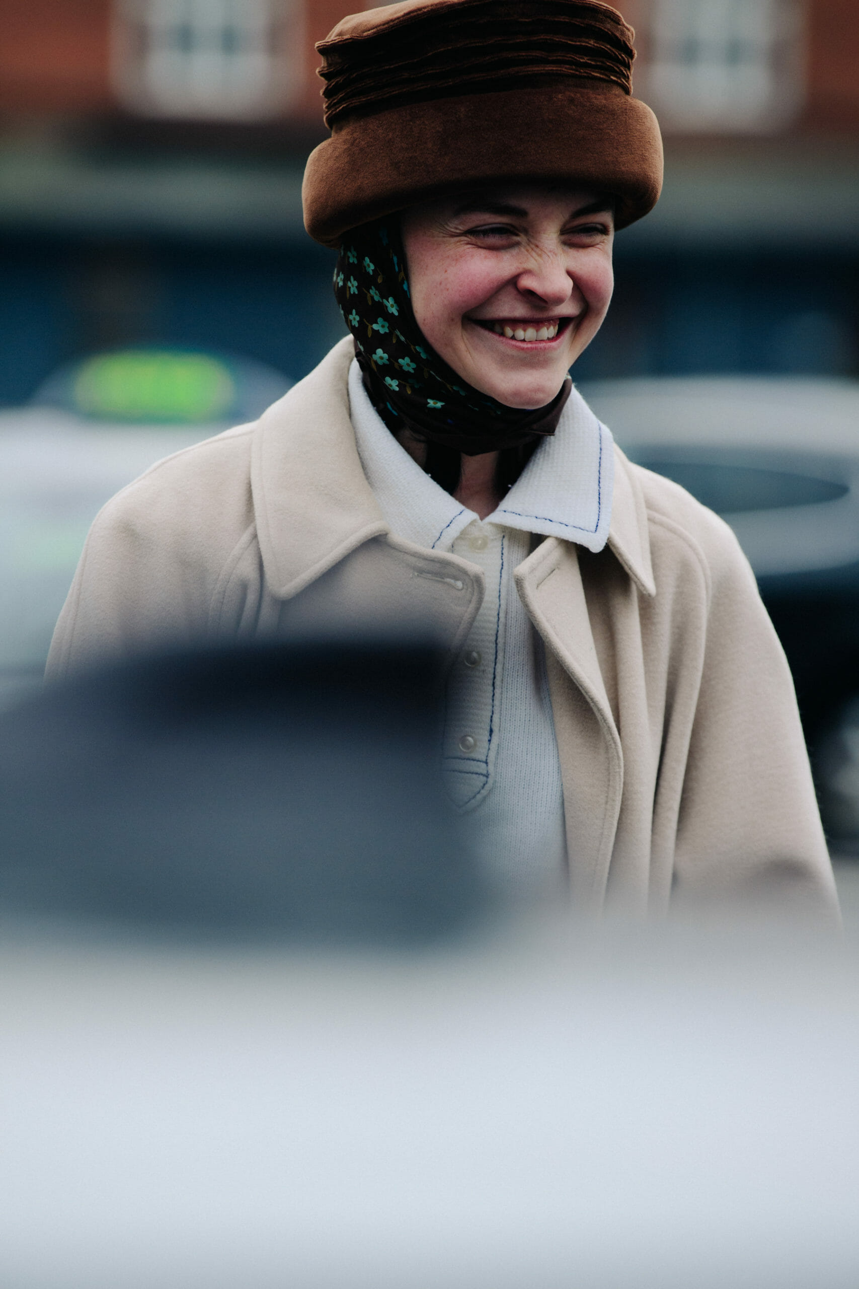 Woman wearing brown hat