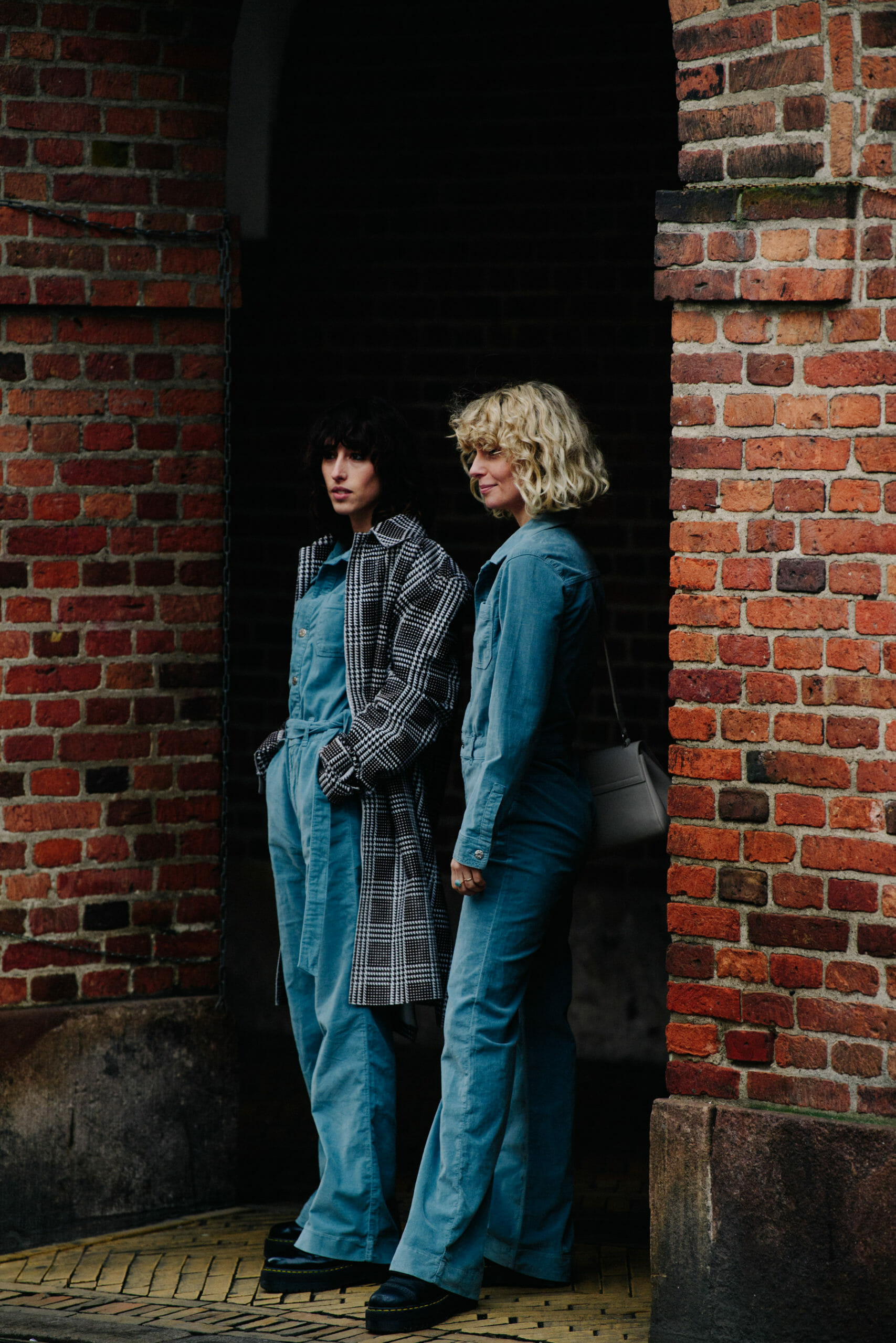 Two women wearing denim outfits