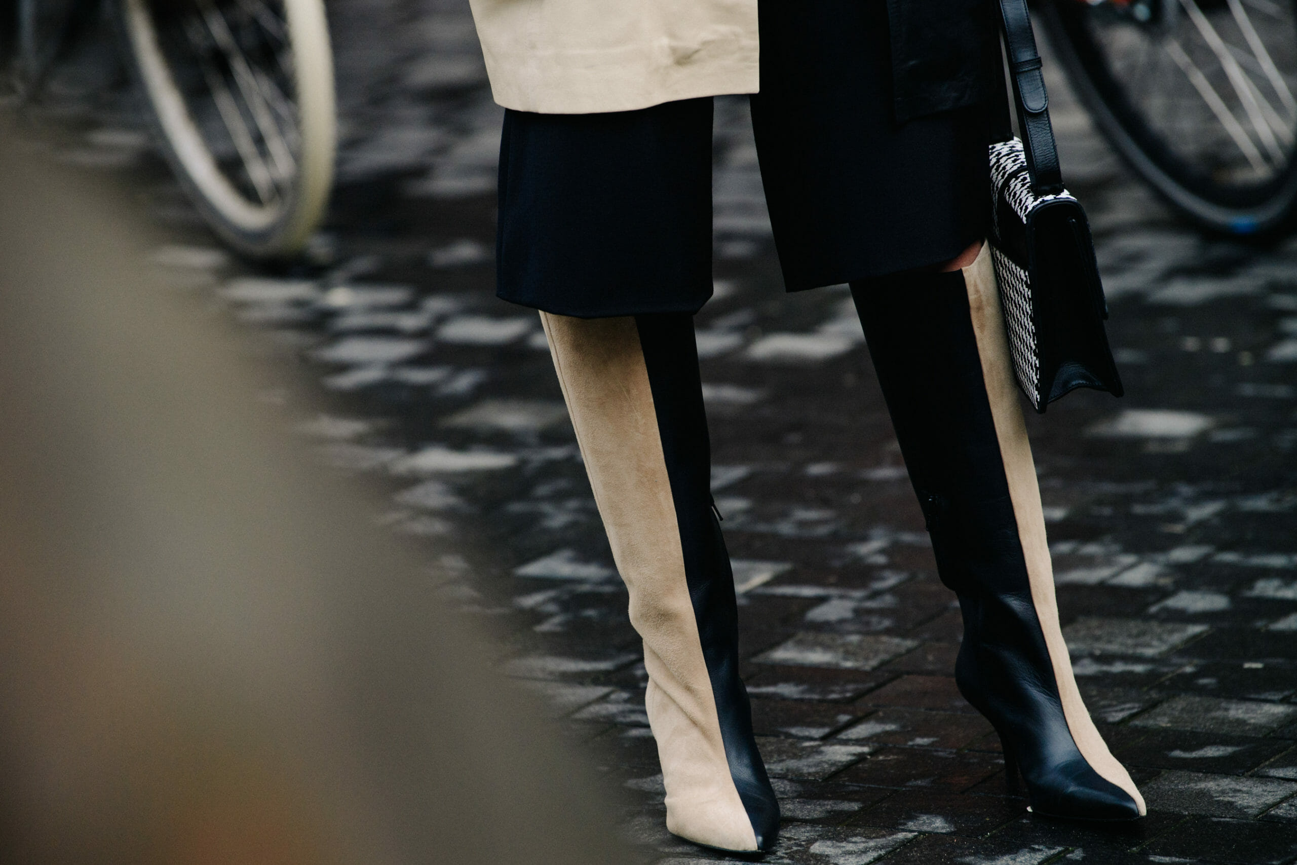 Woman wearing two tone boots