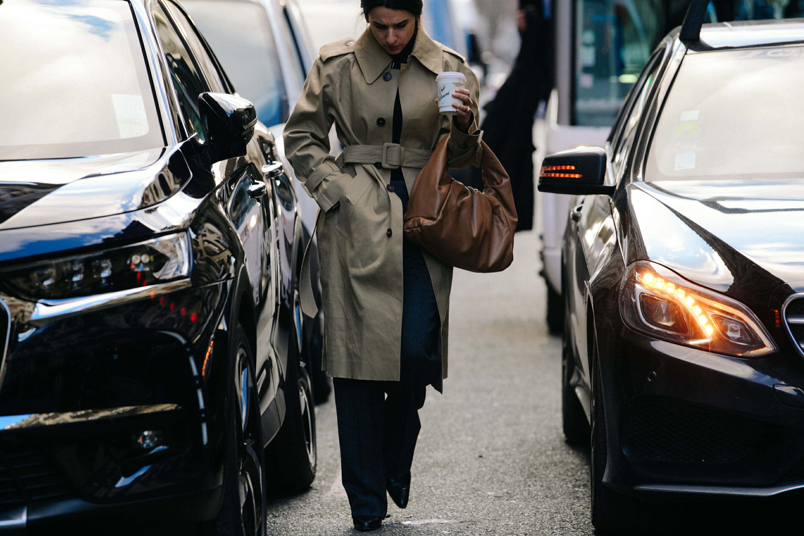 Woman wearing tan coat