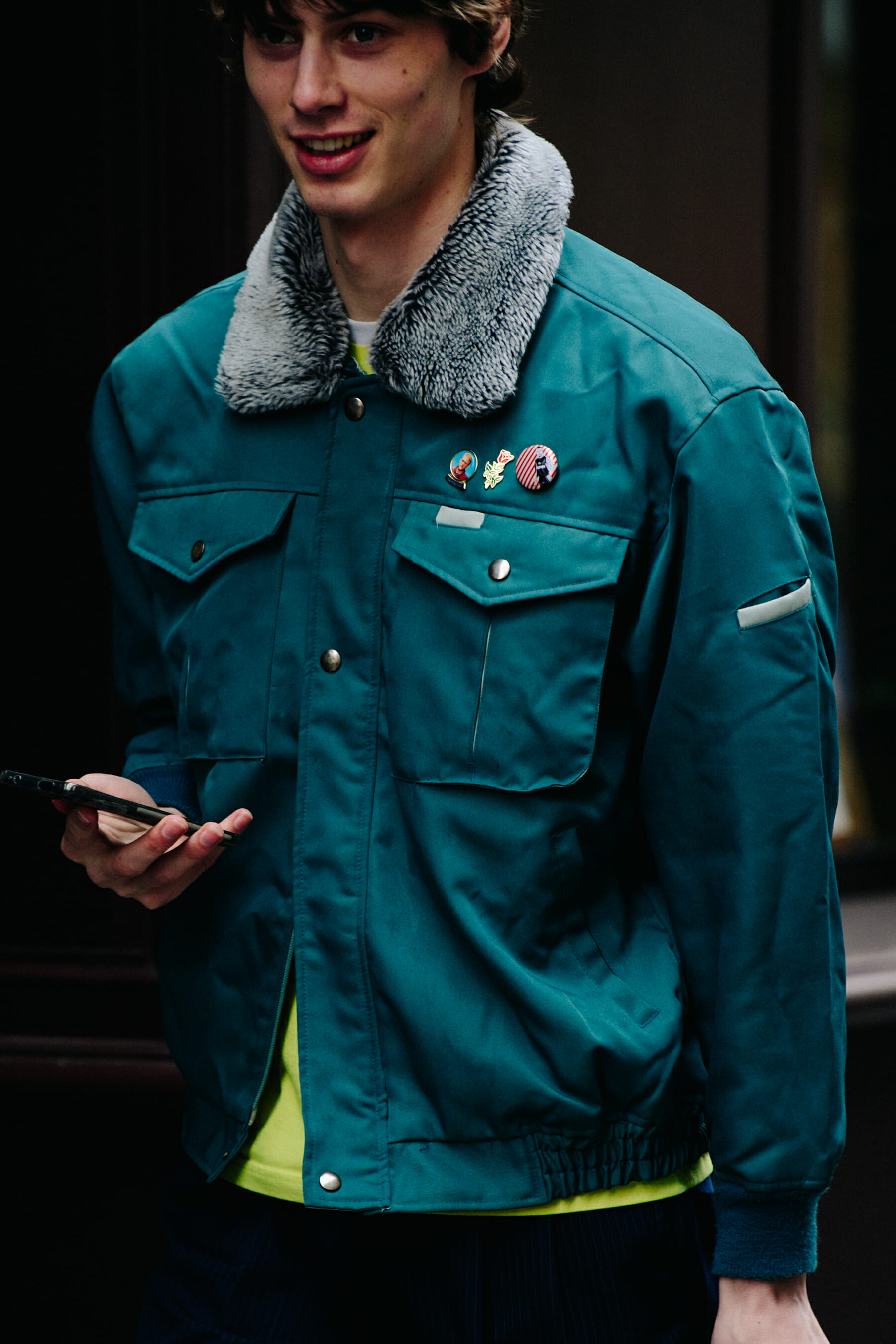 Model wearing blue jacket