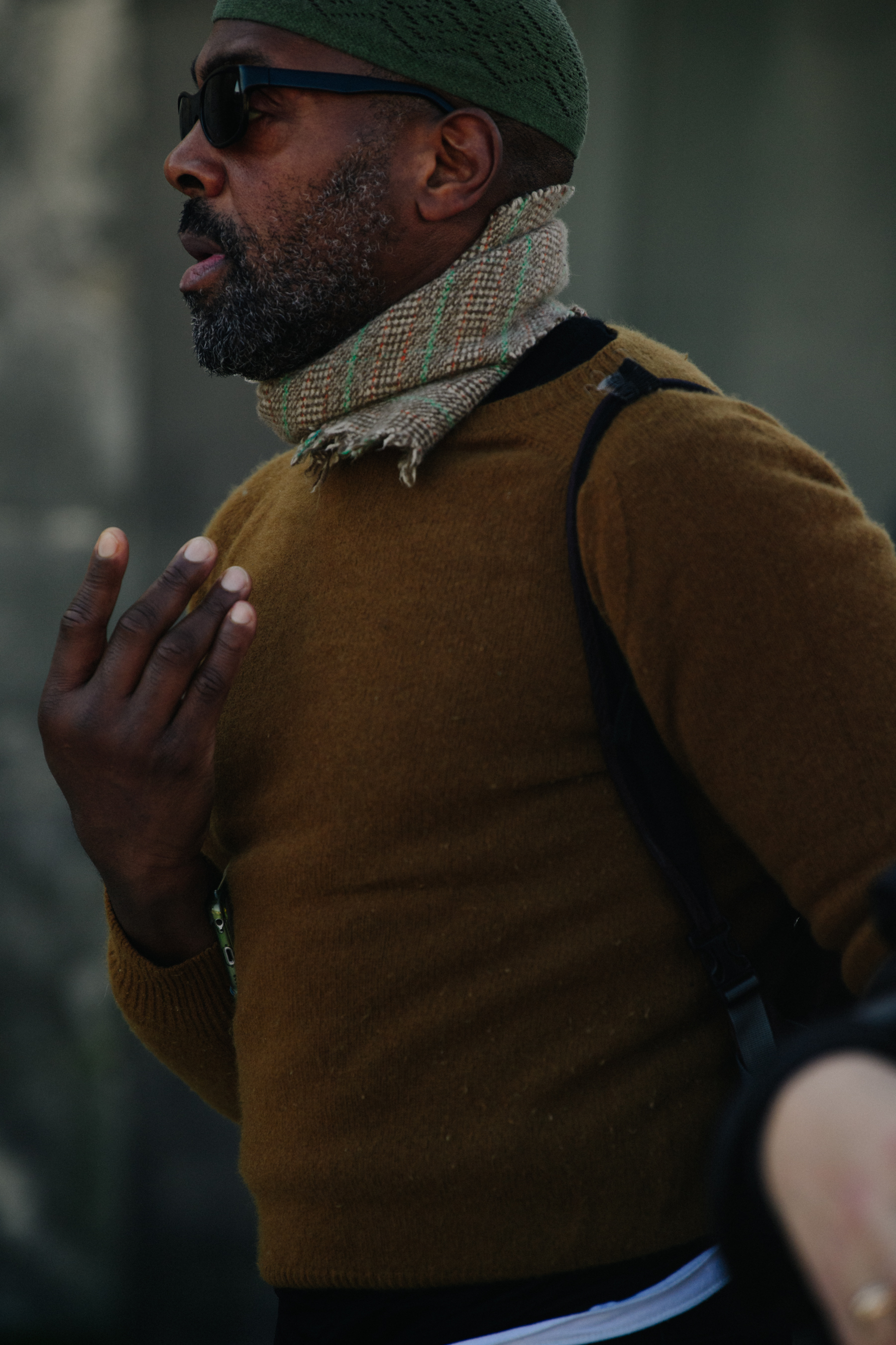 Man wearing brown jumper