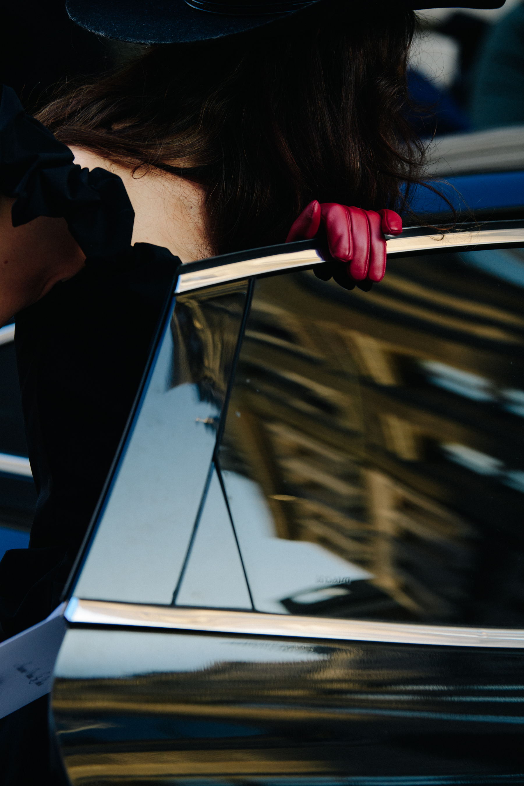 Woman wearing red glove