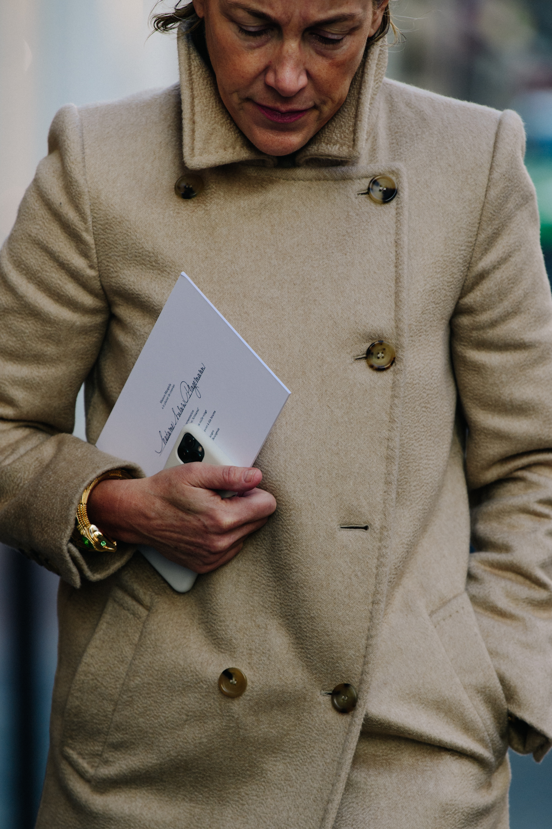 Woman wearing gold watch