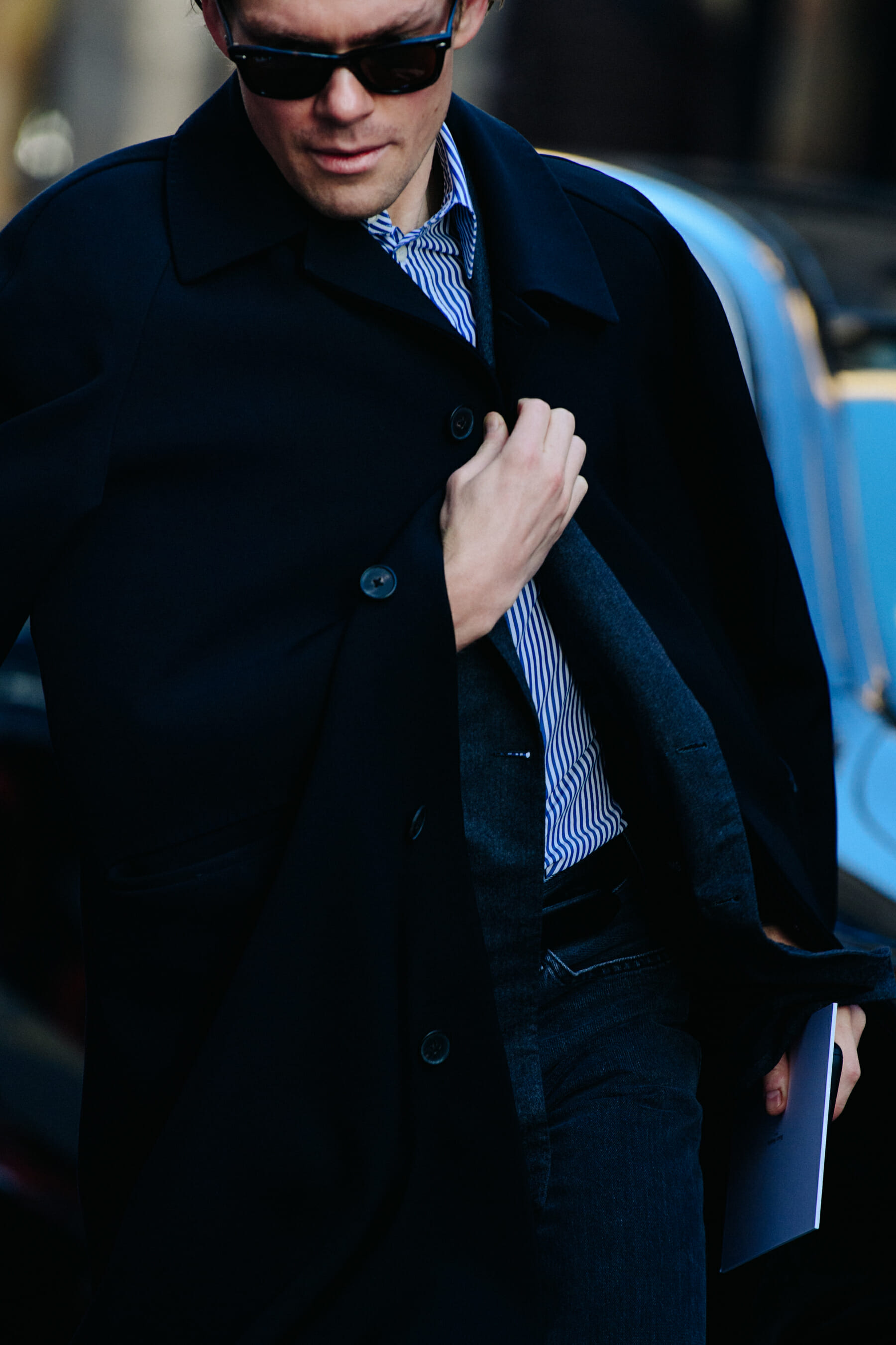Man wearing dark coat