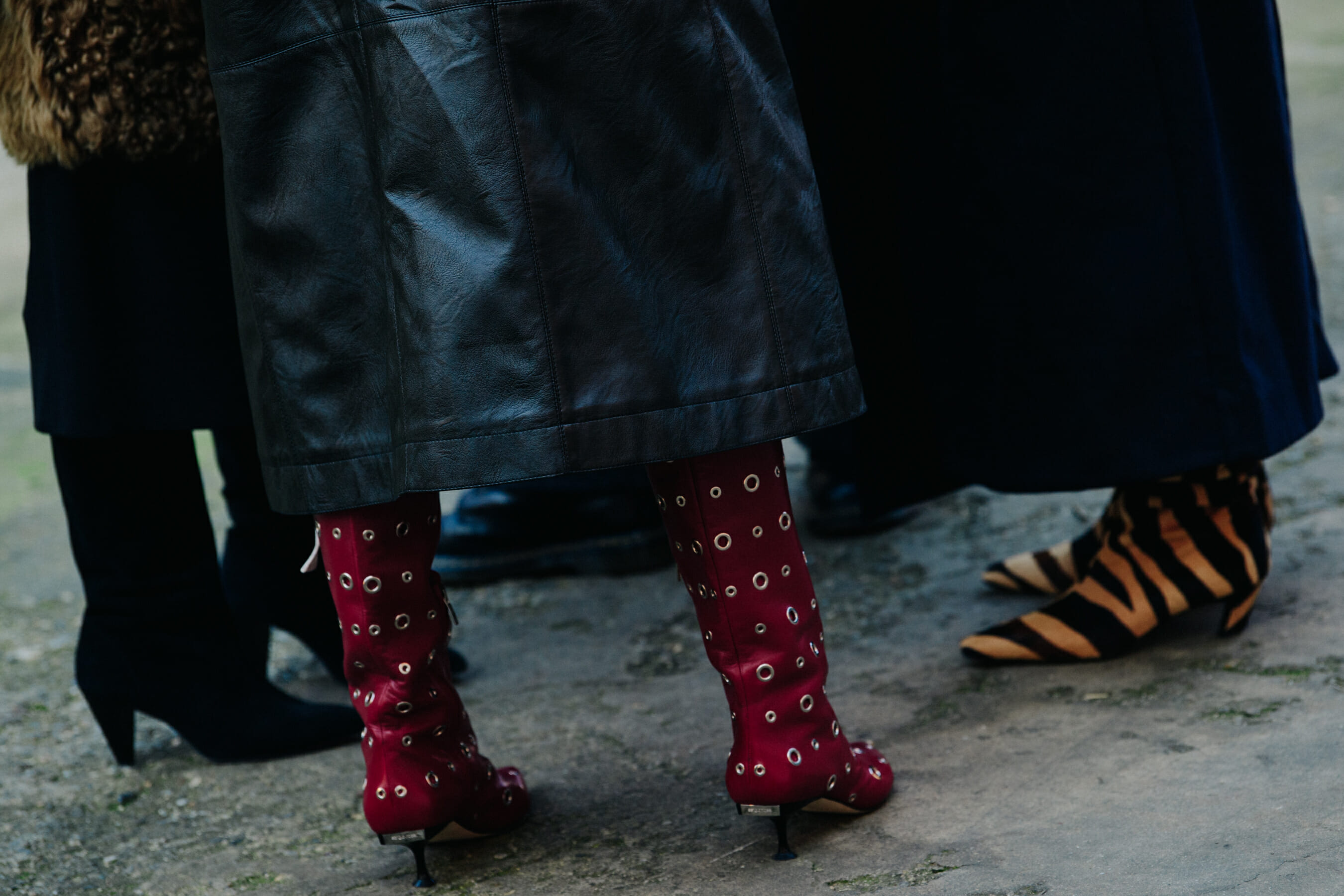 Woman wearing red heeled boots