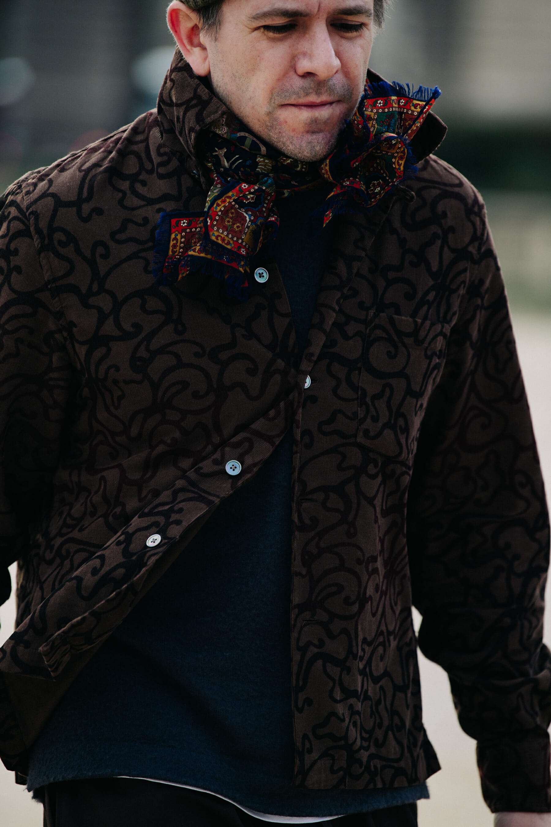 Man wearing brown jacket