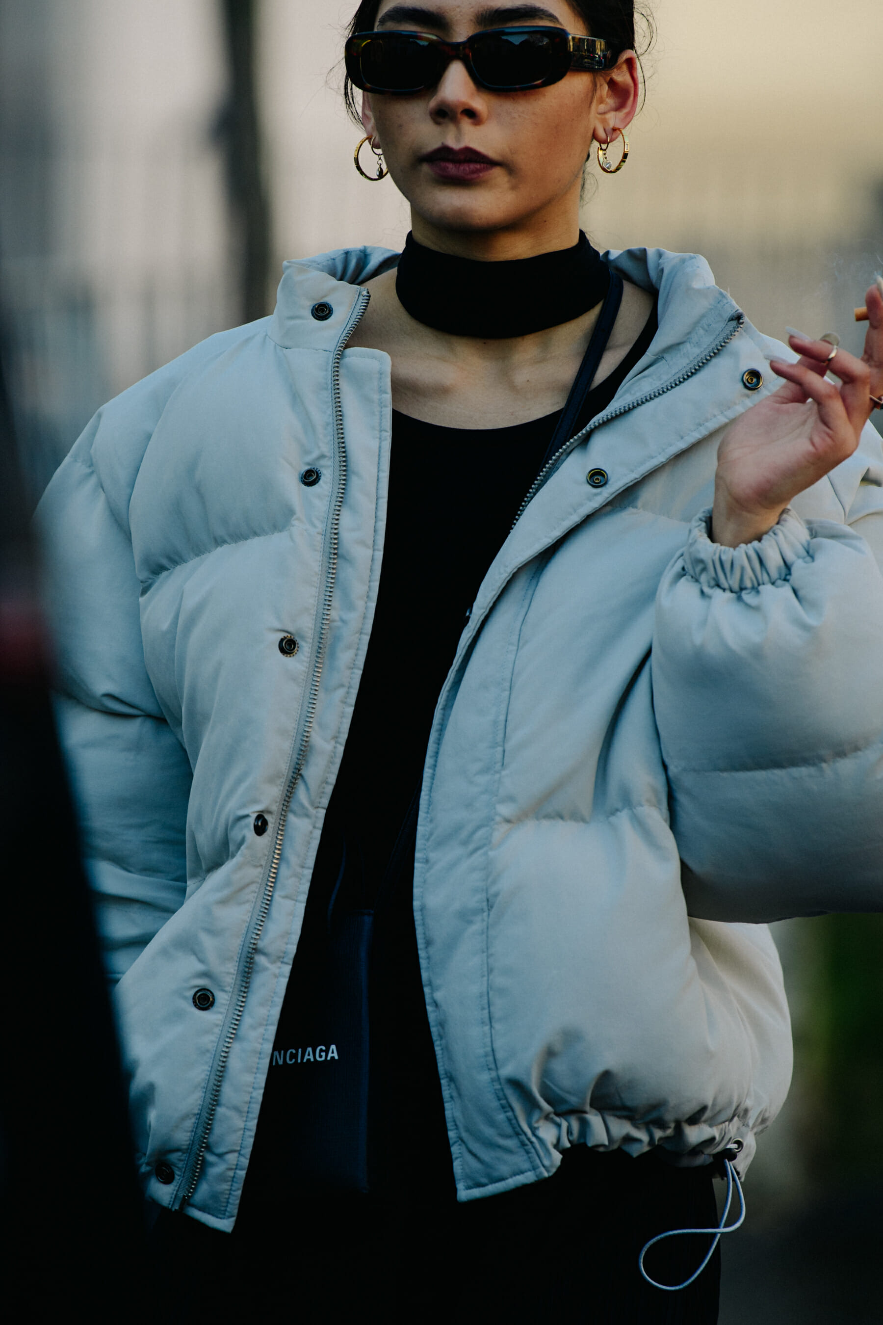 Woman wearing grey coat