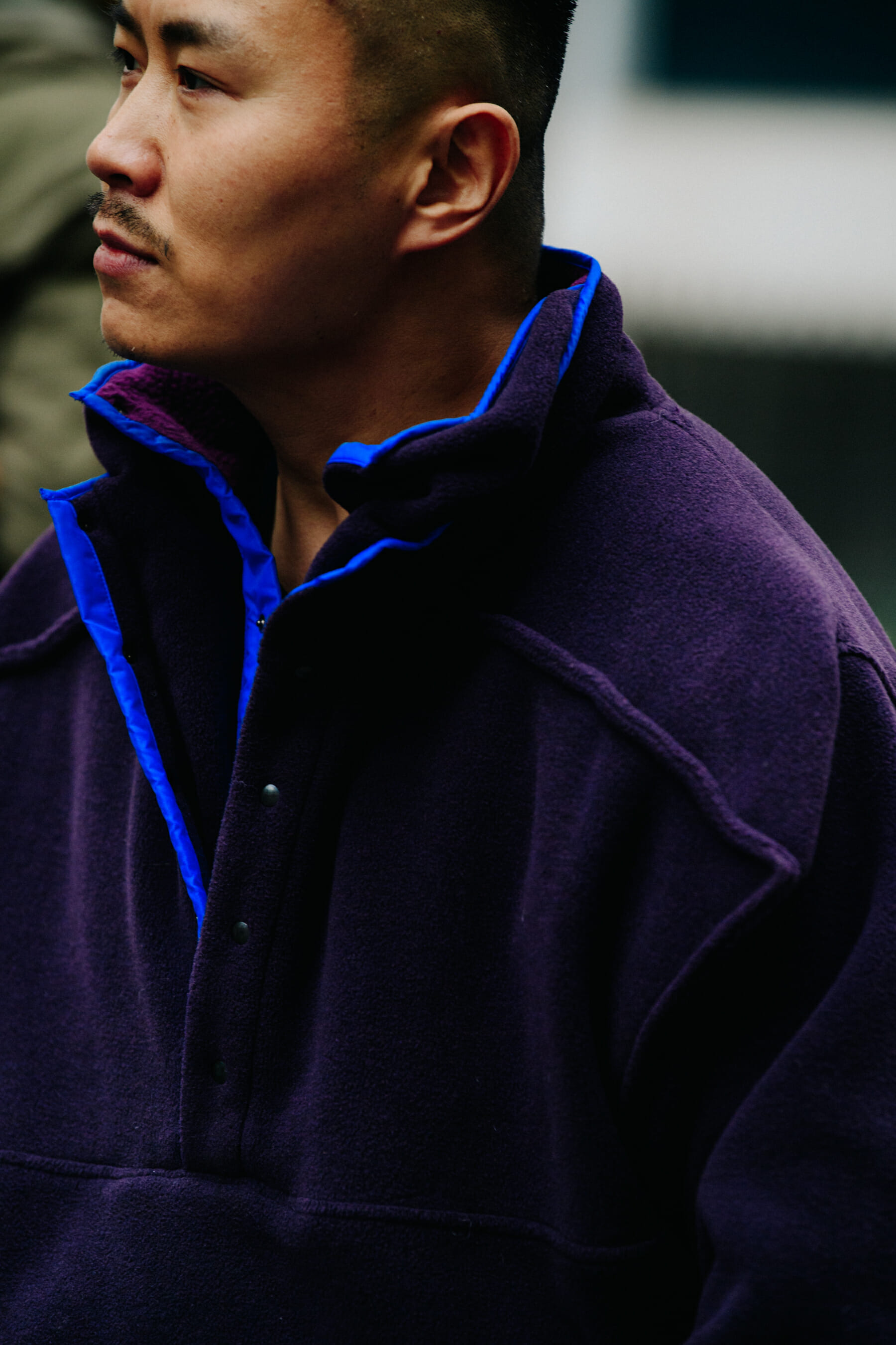 Man wearing purple fleece