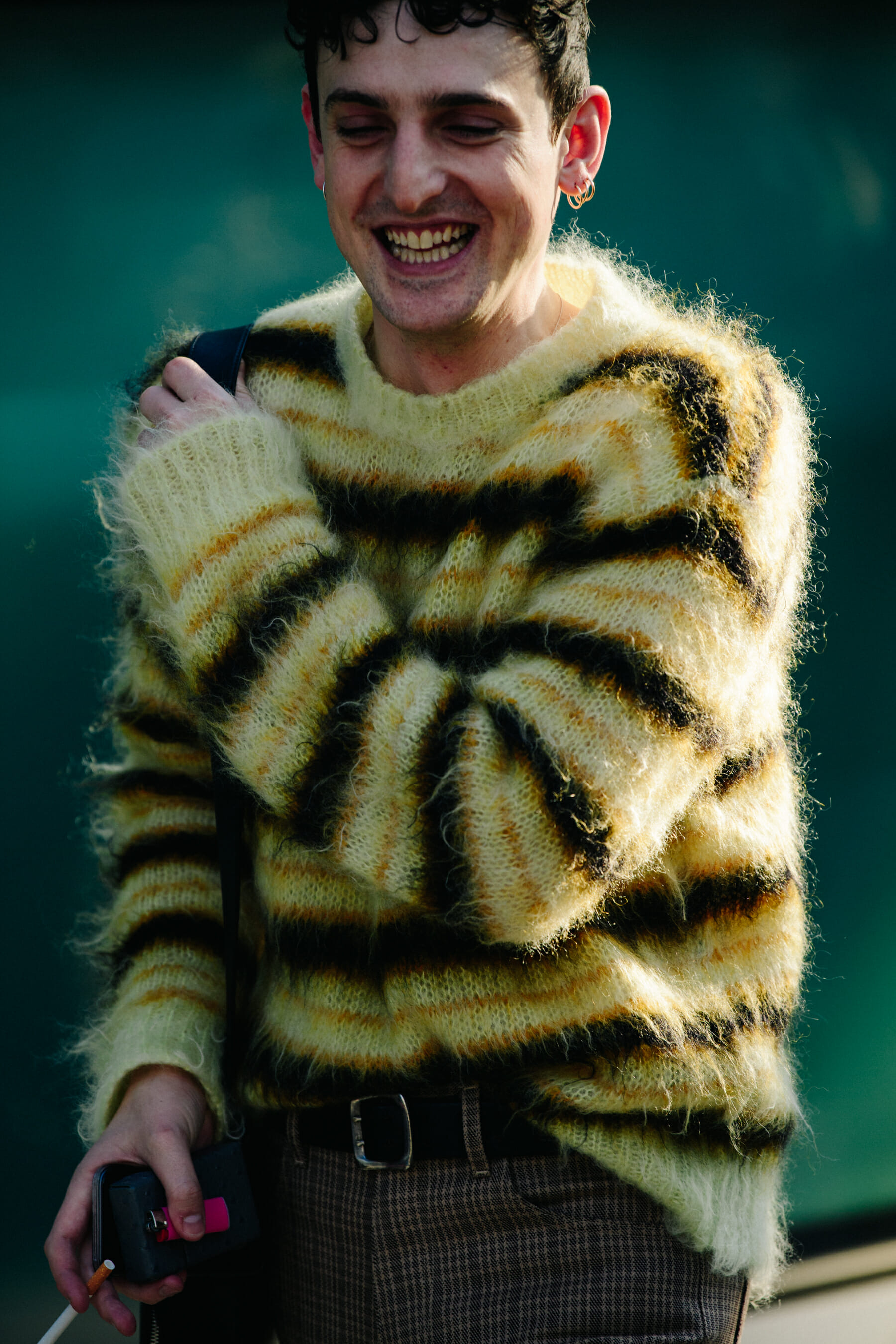 Man wearing striped wooly jumper
