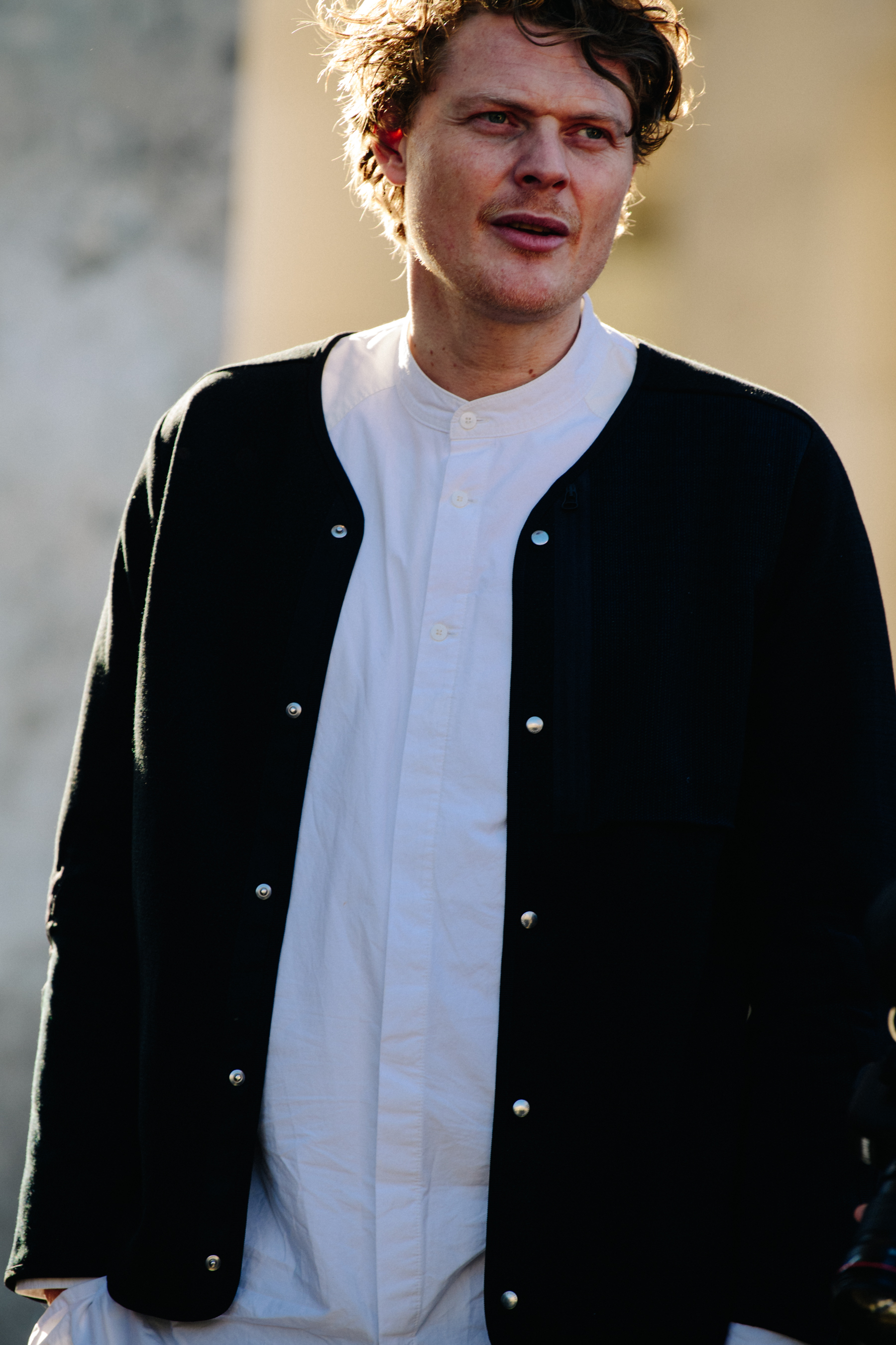 Dutch designer wearing white shirt