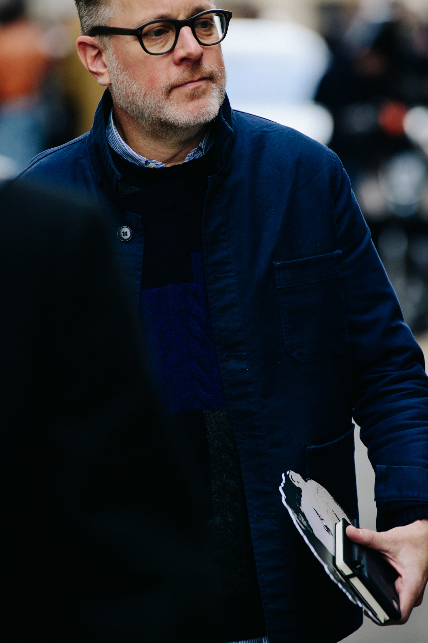 Man wearing navy jacket