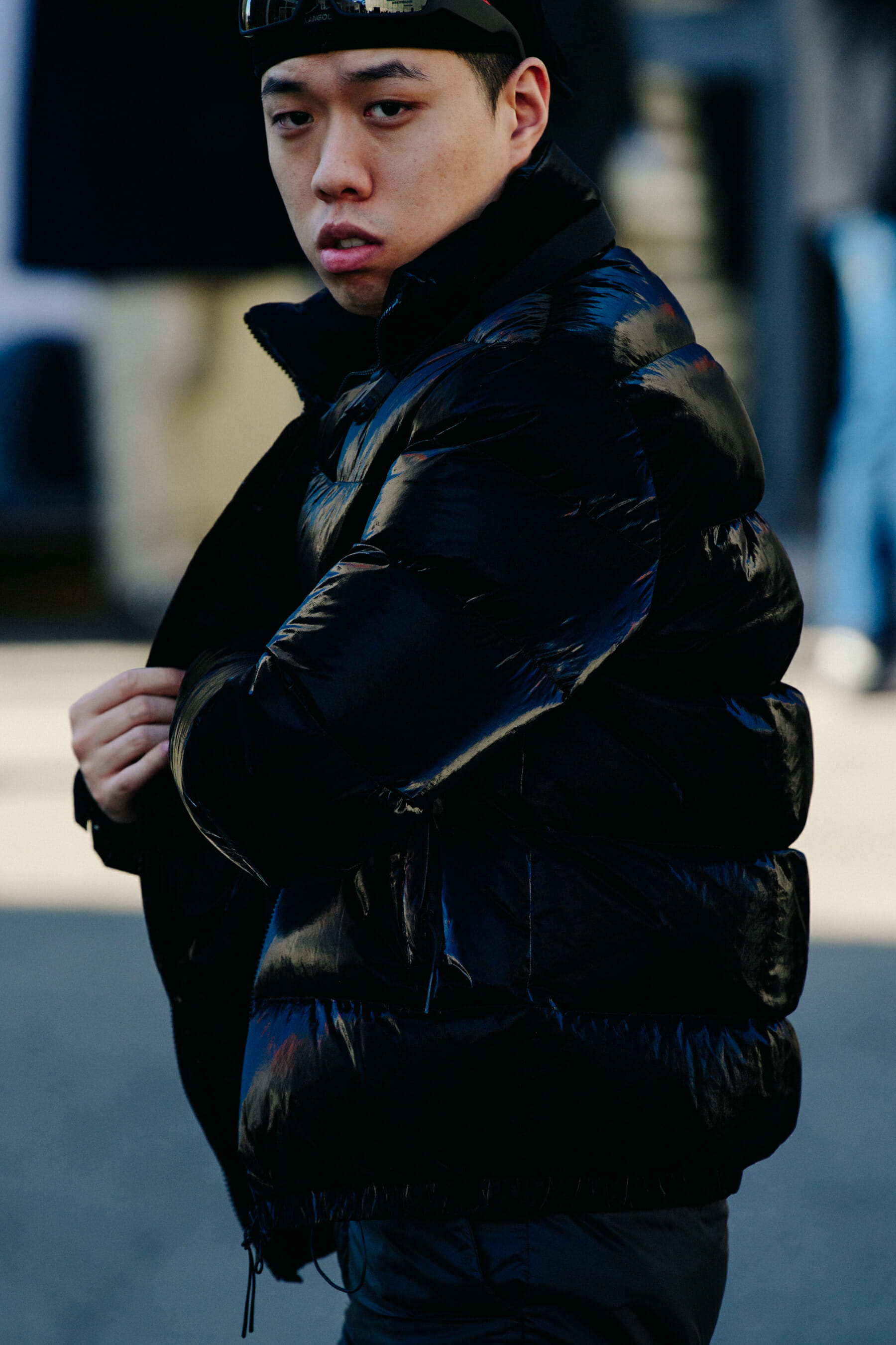 Man wearing dark puffer jacket