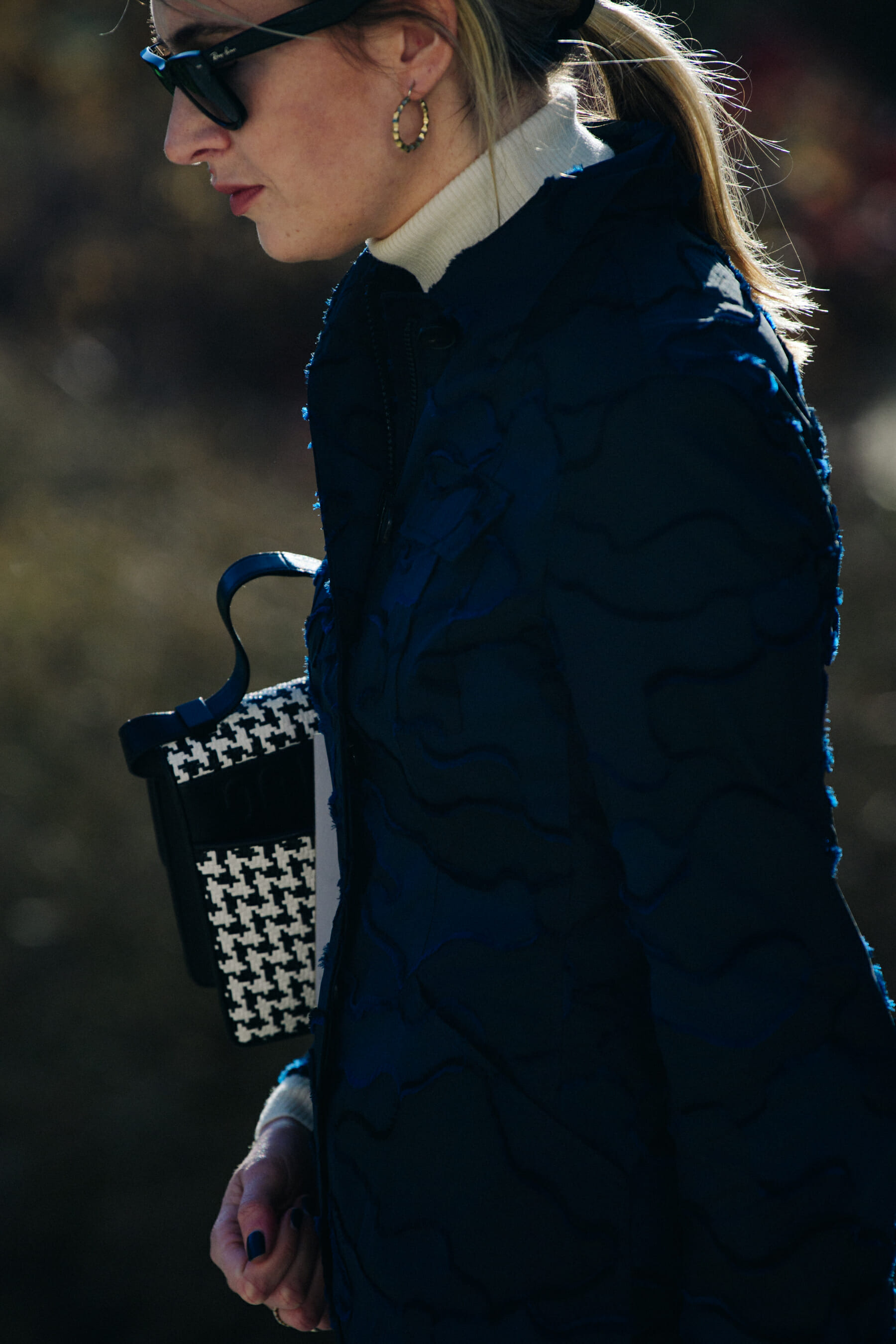 French woman wearing Ray Ban