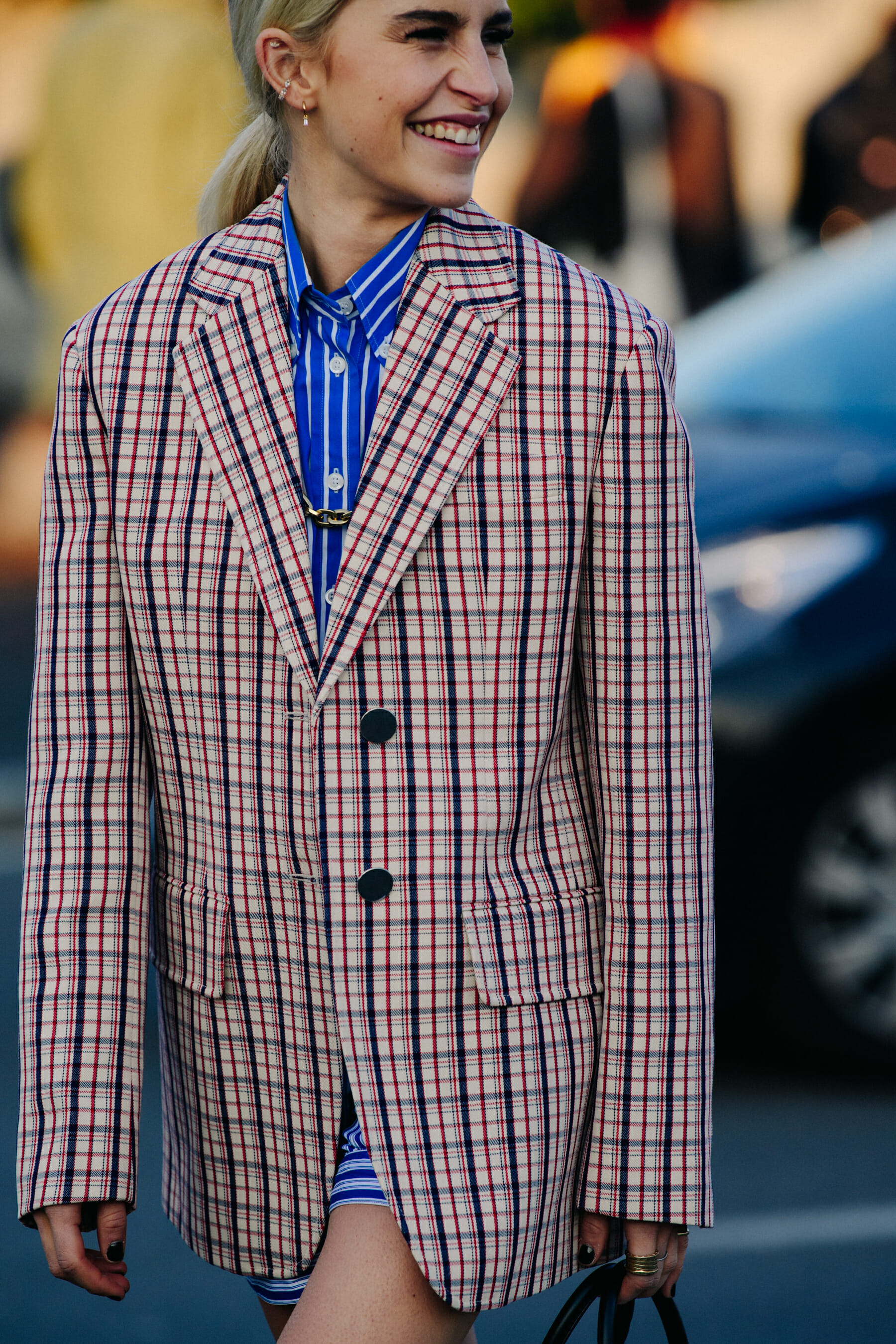 German blogger wearing check jacket