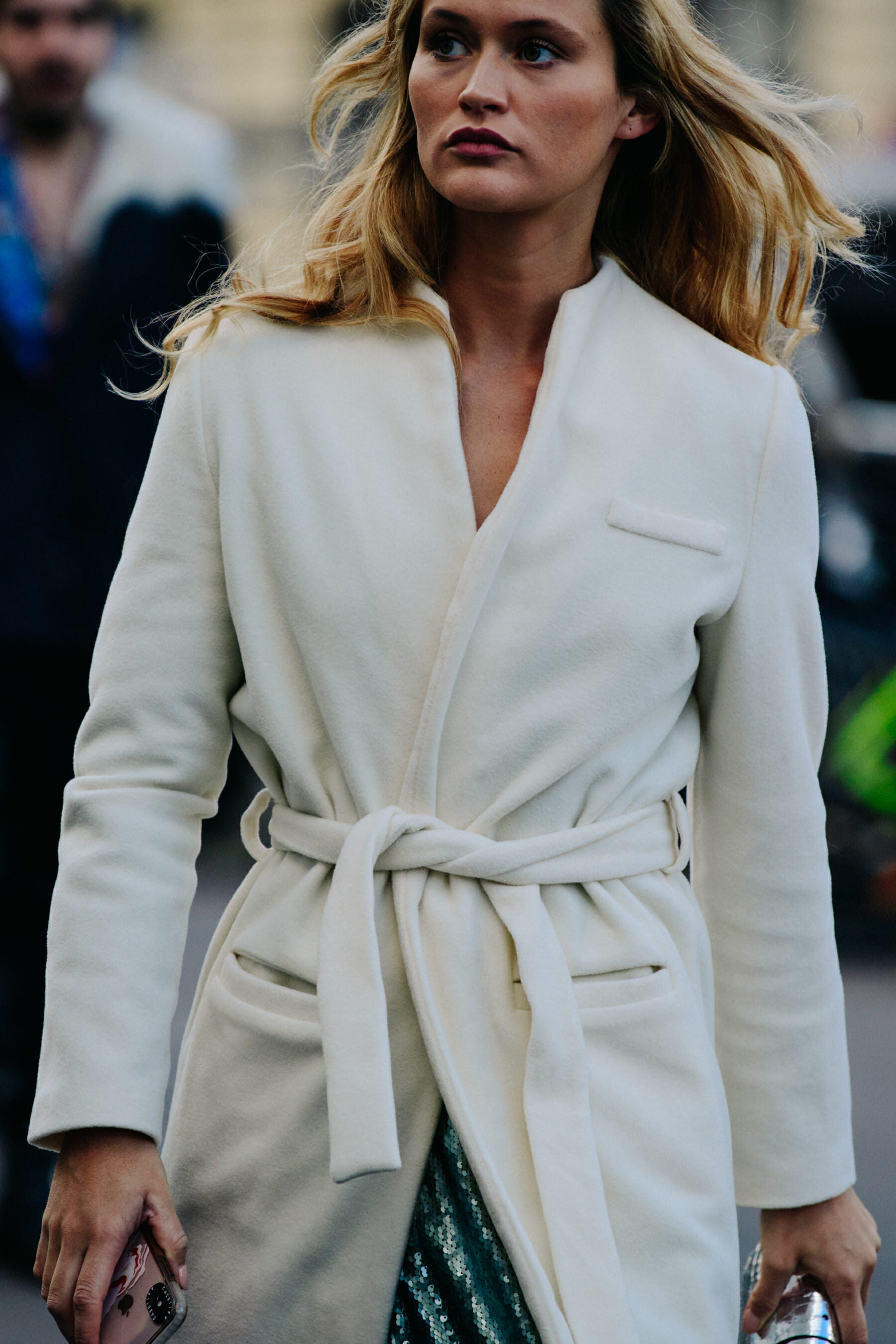 Woman wearing white coat