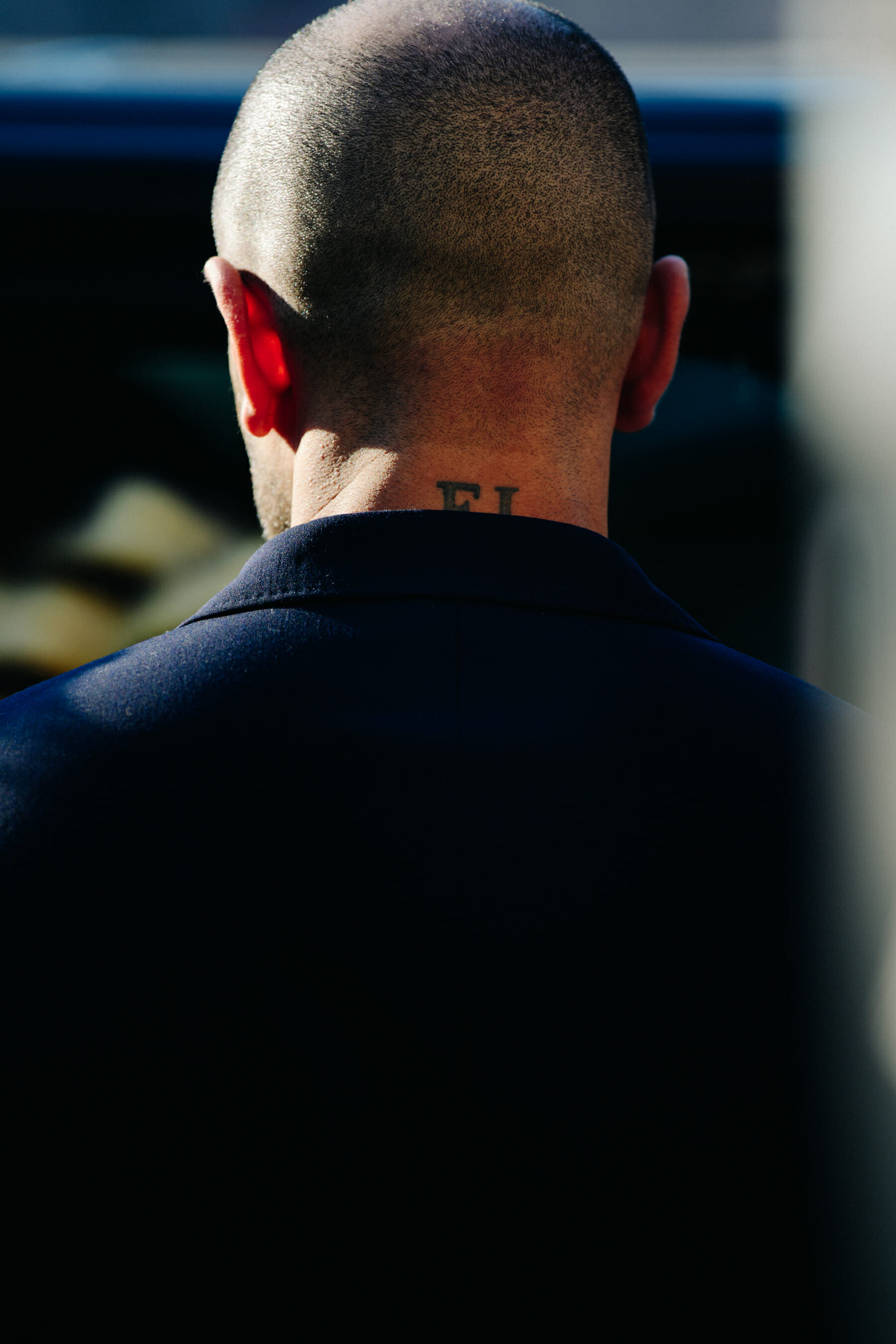 Man with neck tattoo