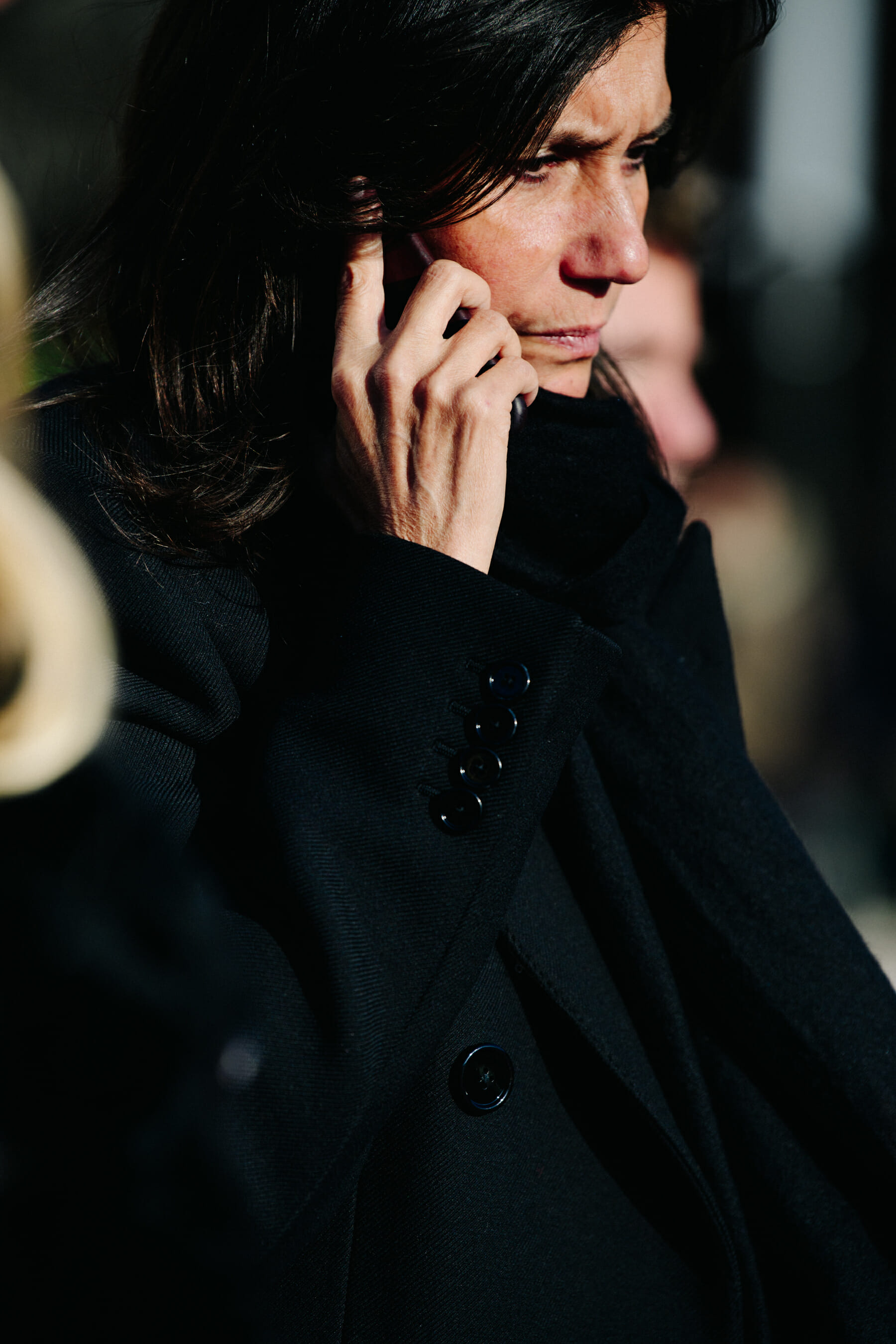 Woman wearing black coat