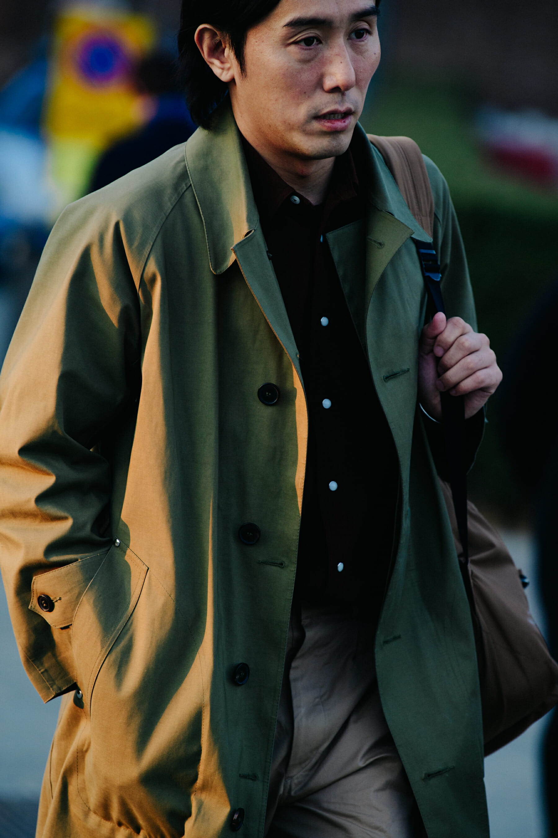 Man wearing tan coat