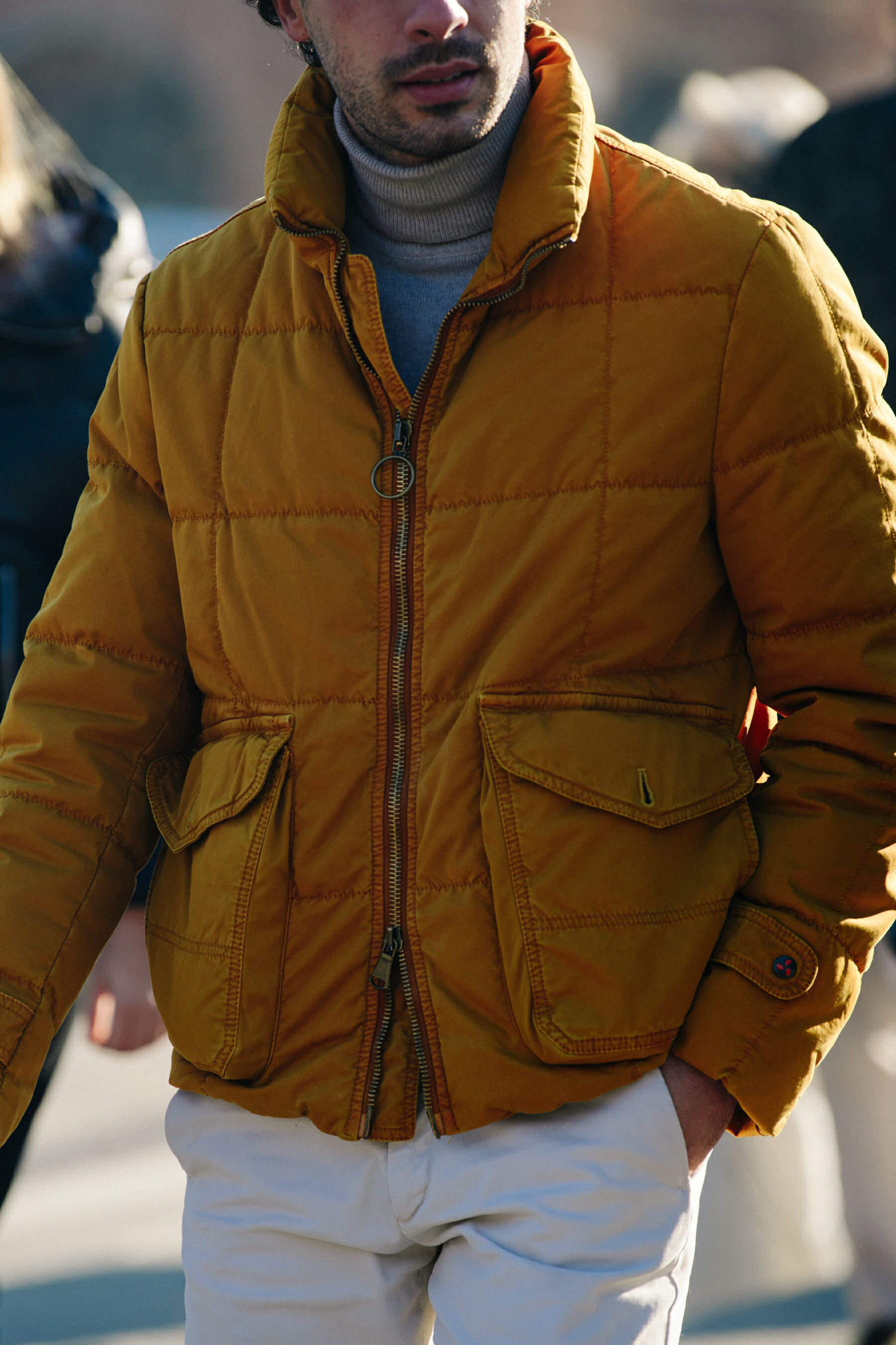 Man wearing yellow jacket